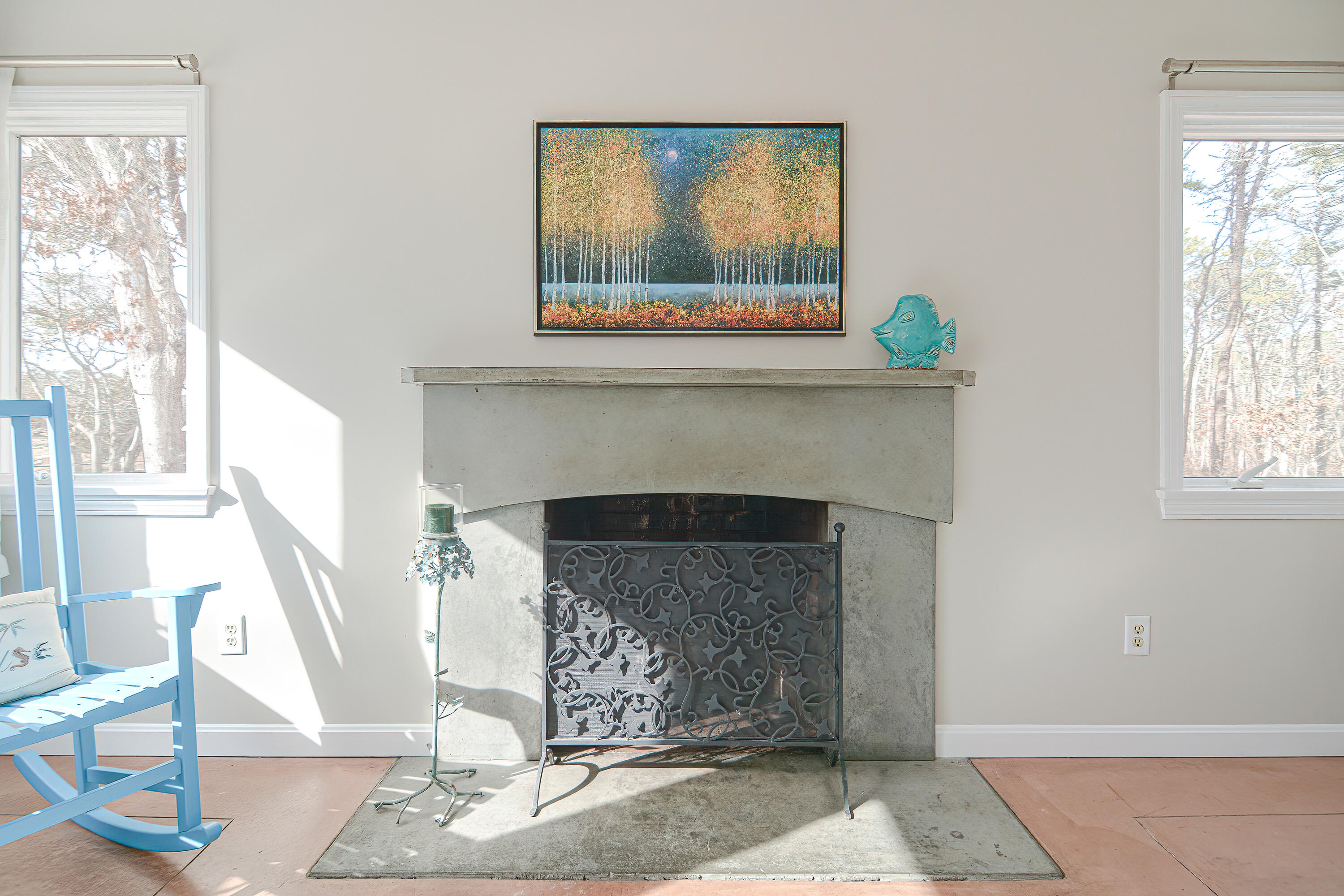 155 Gross Hill Road Wellfleet, MA 02667 - Photo 20 of 52 a living room with a fireplace and a window