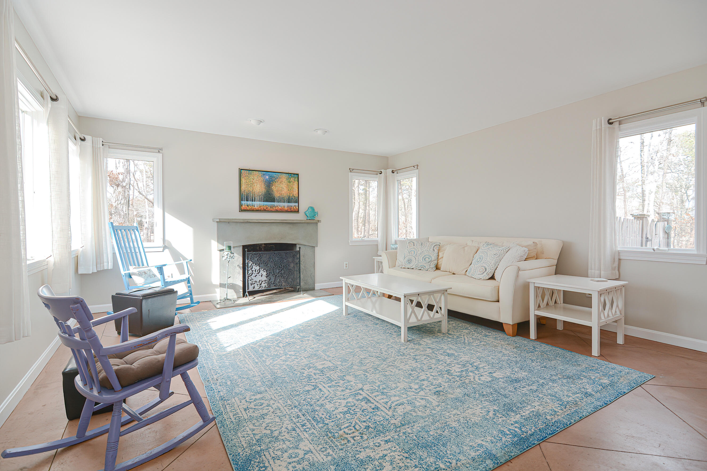 155 Gross Hill Road Wellfleet, MA 02667 - Photo 21 of 52 a living room with furniture and a fireplace