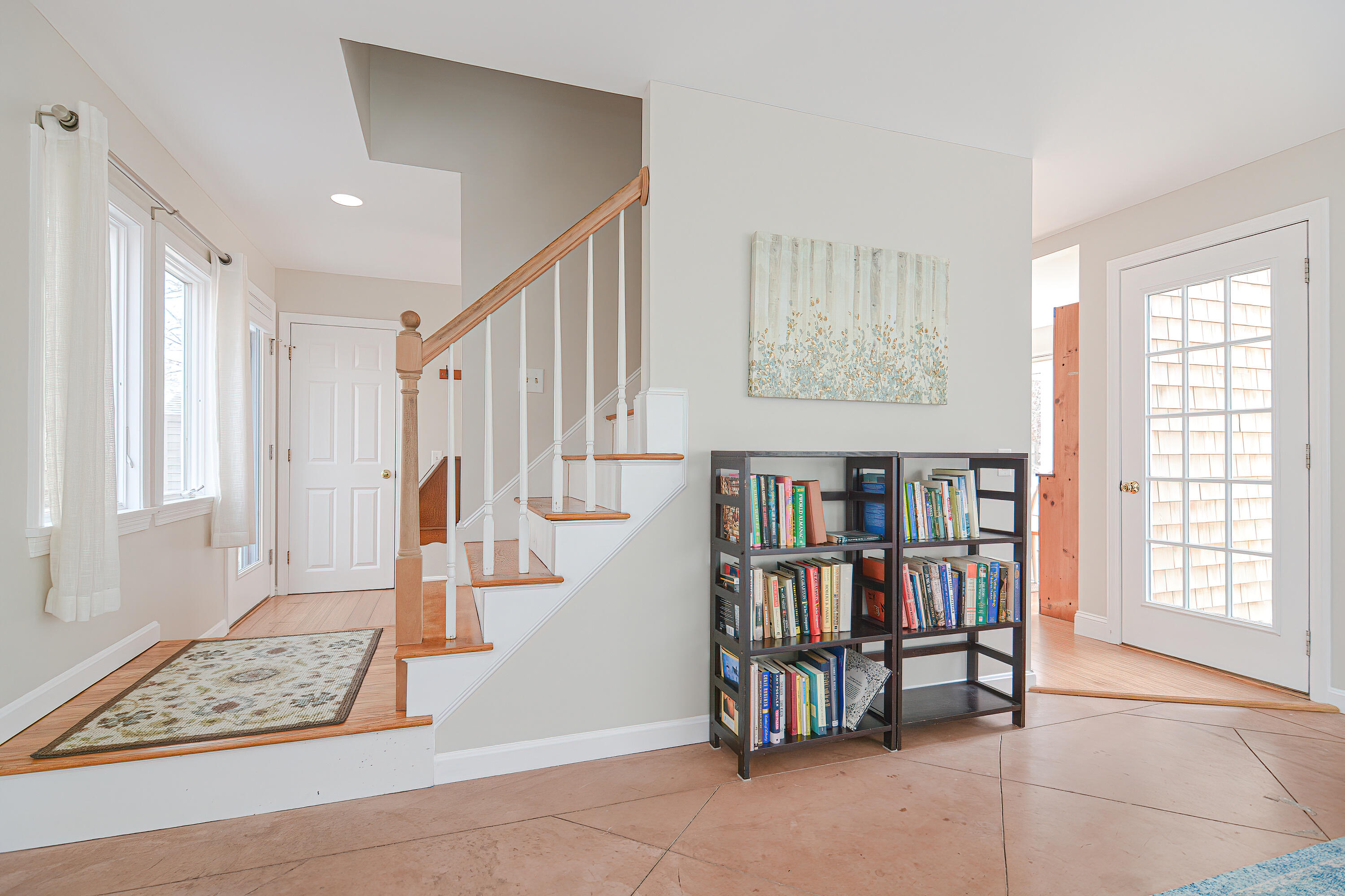 155 Gross Hill Road Wellfleet, MA 02667 - Photo 26 of 52 a view of an entryway with workspace and livingroom view