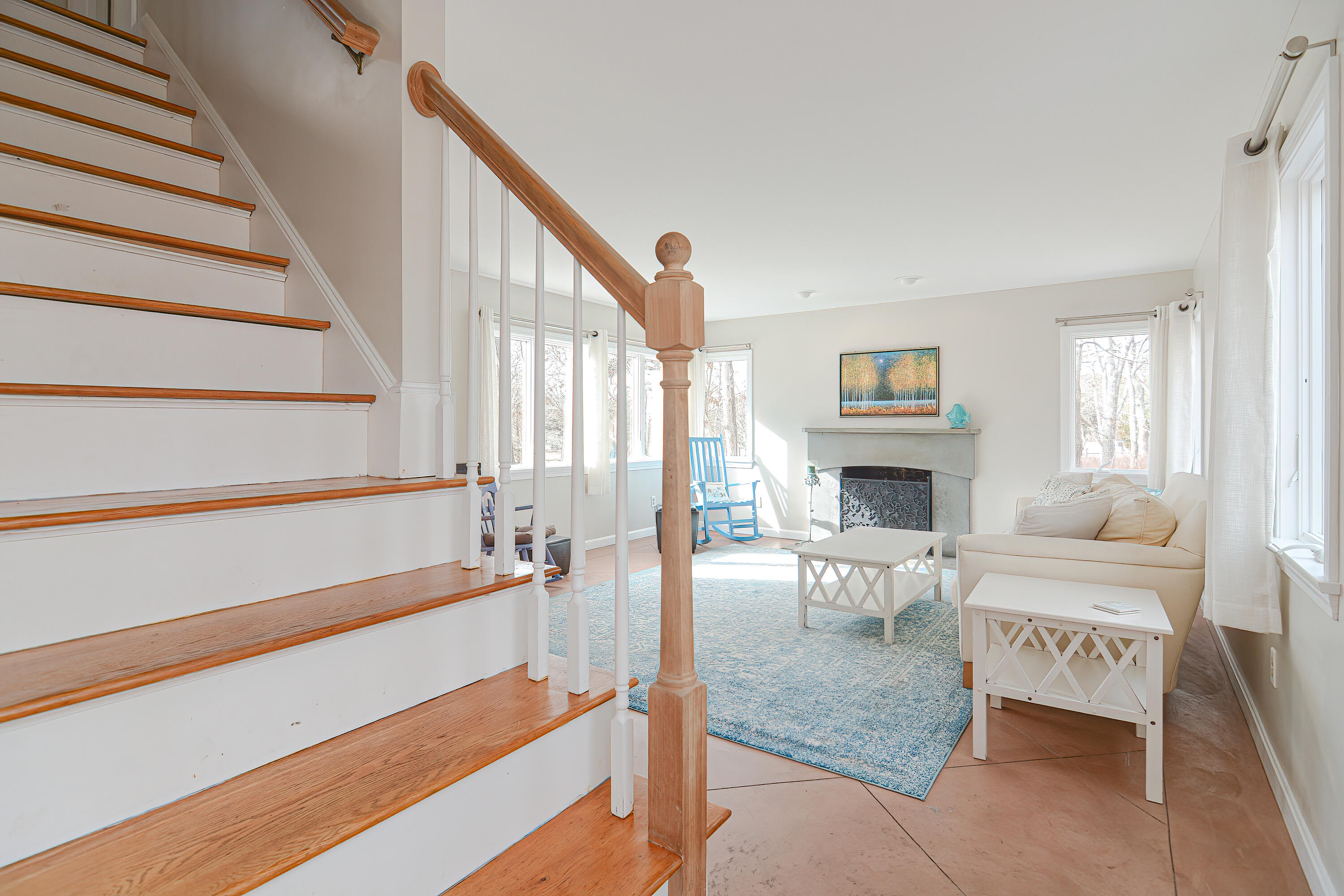 155 Gross Hill Road Wellfleet, MA 02667 - Photo 27 of 52 a living room with furniture and a fireplace