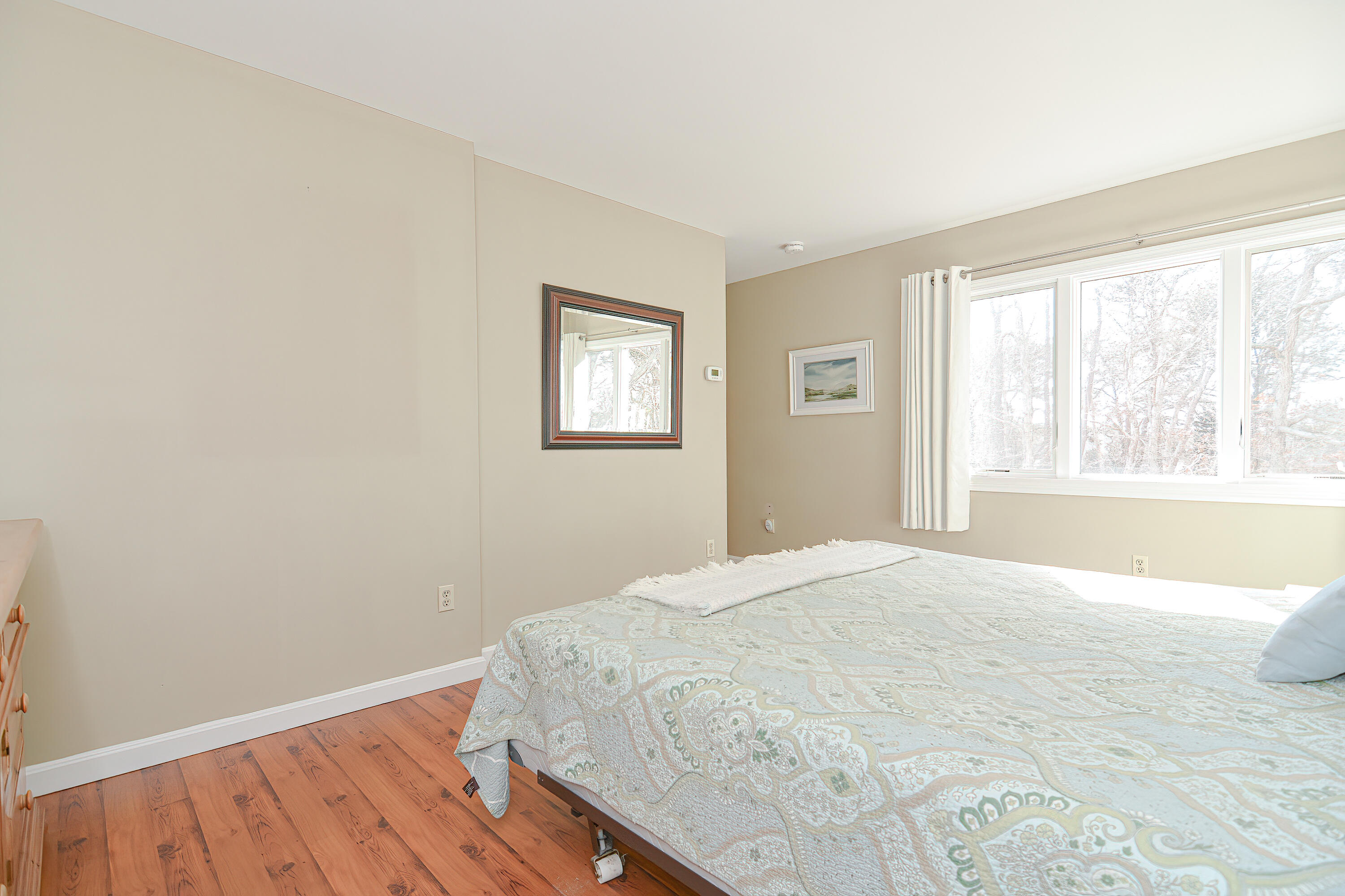 155 Gross Hill Road Wellfleet, MA 02667 - Photo 30 of 52 a bedroom with a bed and a window