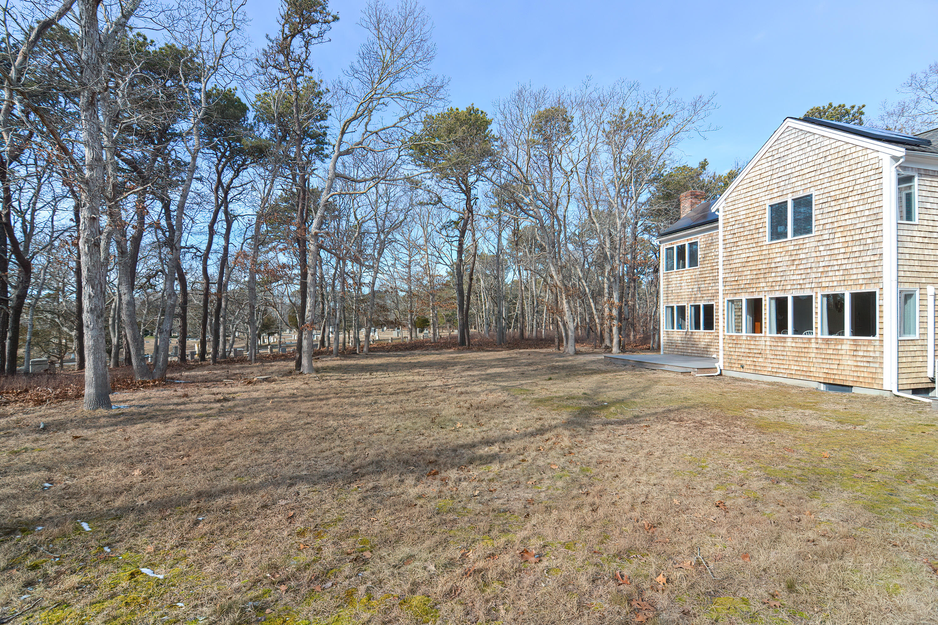 155 Gross Hill Road Wellfleet, MA 02667 - Photo 3 of 52 a view of a yard with a house