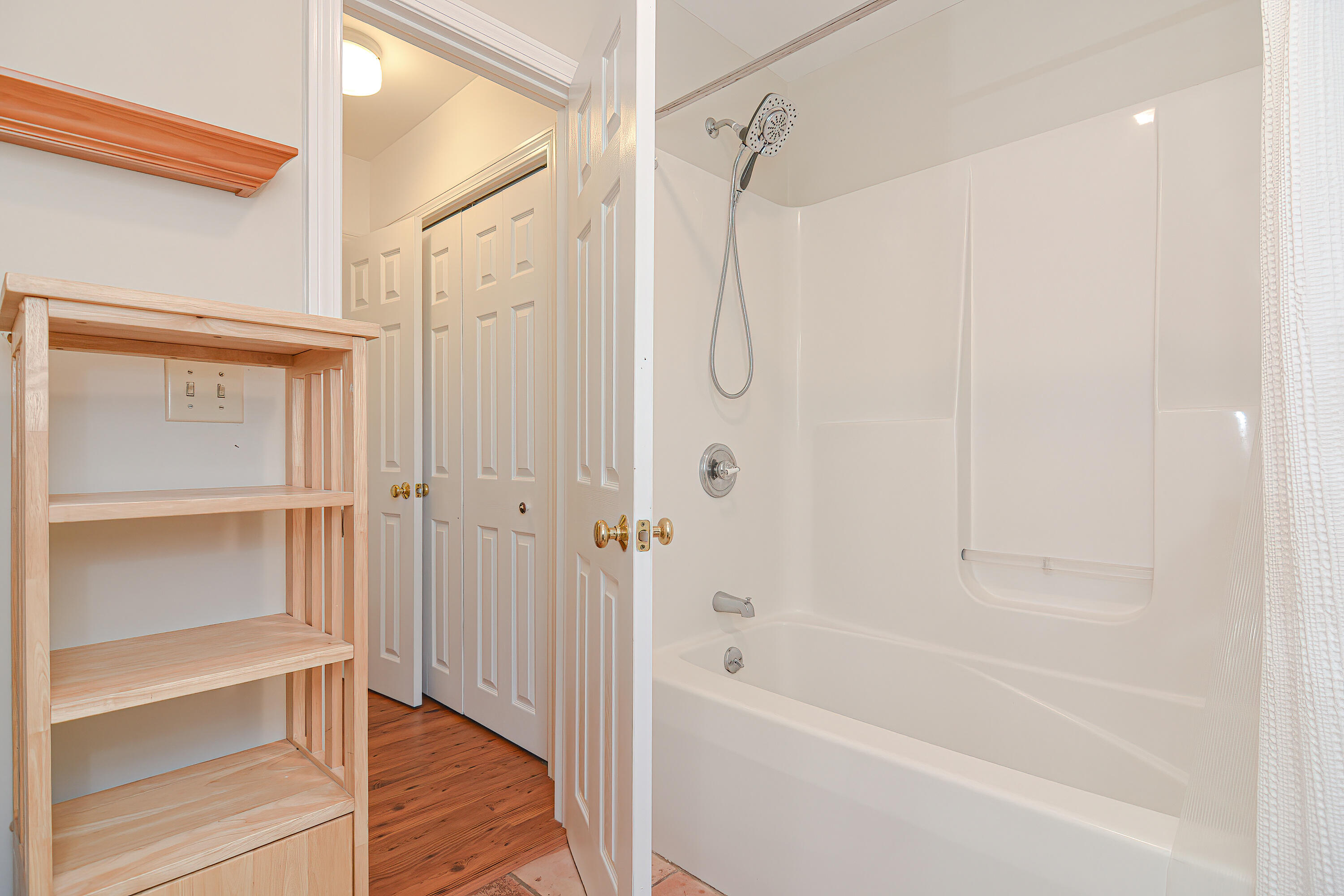 155 Gross Hill Road Wellfleet, MA 02667 - Photo 33 of 52 a bathroom with a bathtub and a shower