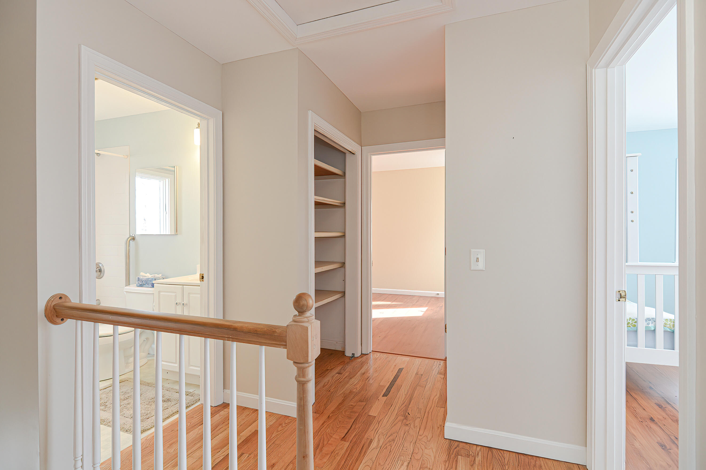 155 Gross Hill Road Wellfleet, MA 02667 - Photo 36 of 52 a view of a room with wooden floor and windows