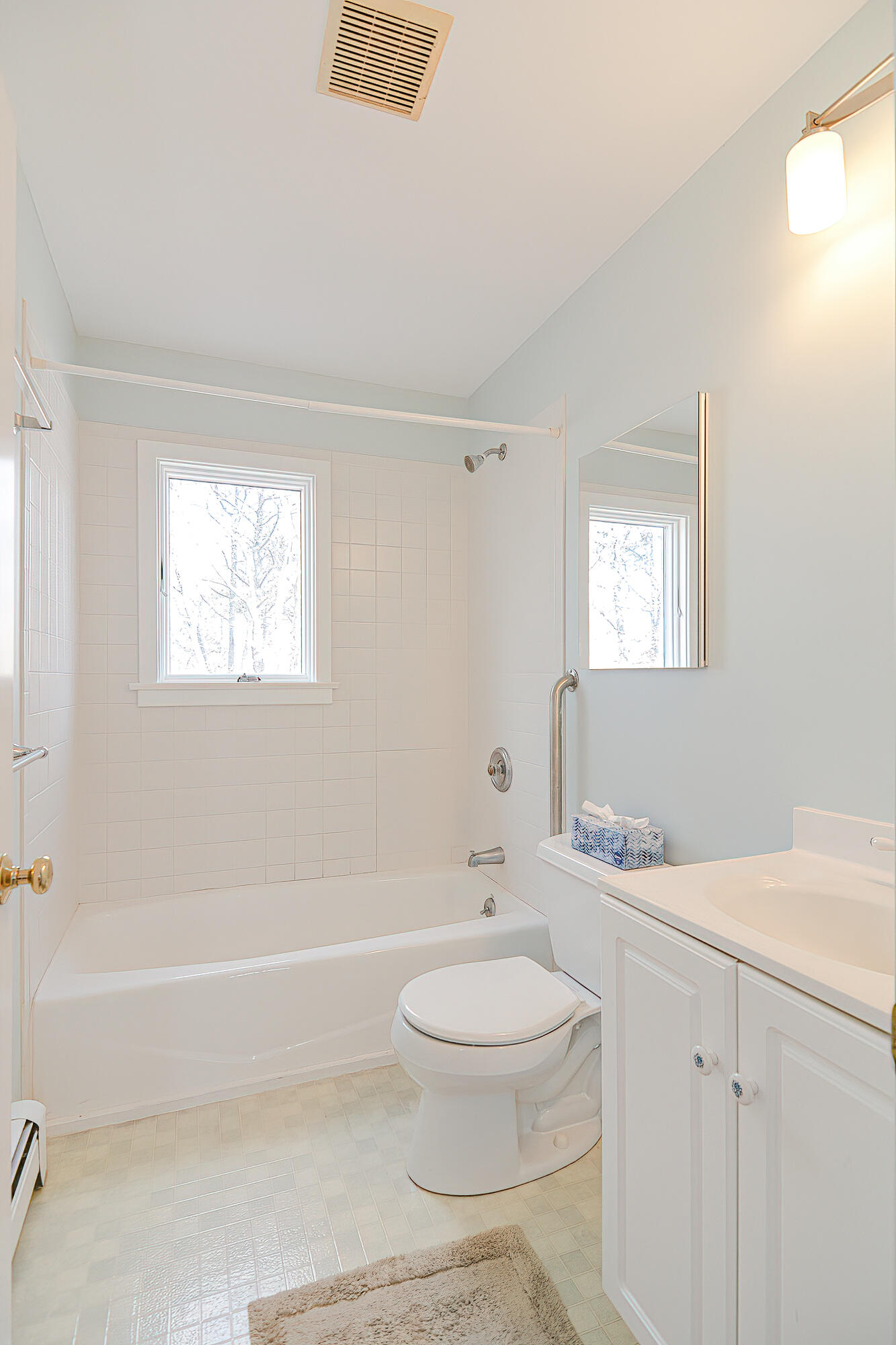 155 Gross Hill Road Wellfleet, MA 02667 - Photo 38 of 52 a bathroom with a toilet a sink a mirror and a bathtub