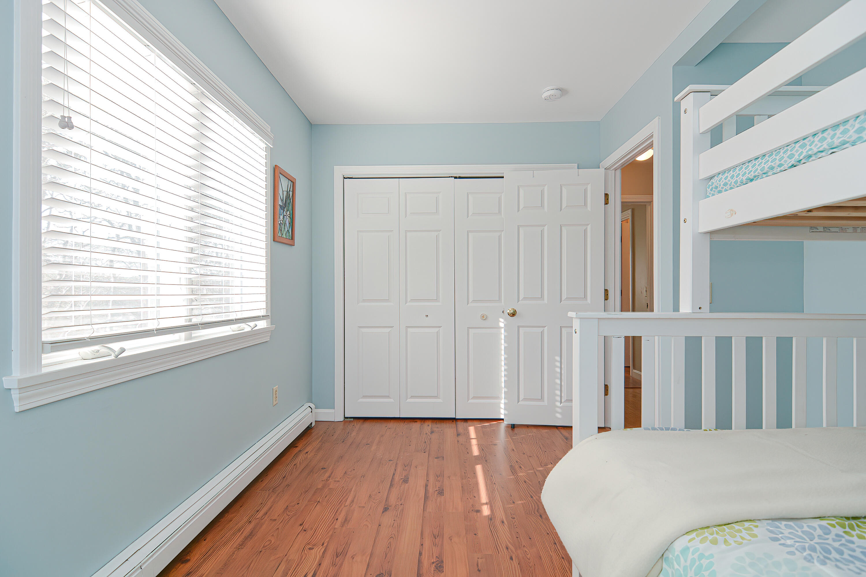 155 Gross Hill Road Wellfleet, MA 02667 - Photo 40 of 52 a bedroom with a bed and a window