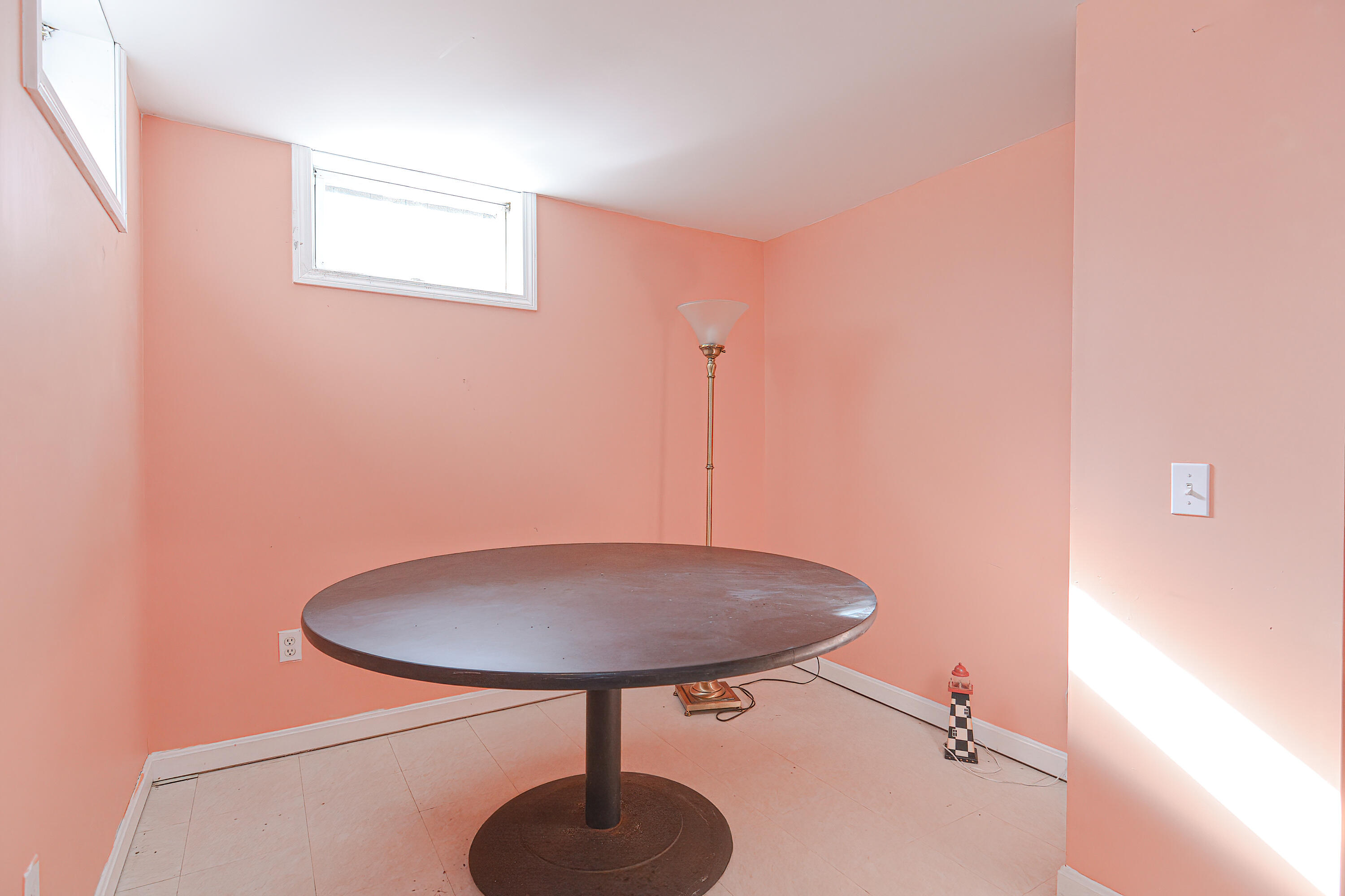 155 Gross Hill Road Wellfleet, MA 02667 - Photo 49 of 52 a view of a room with a chandelier and a table