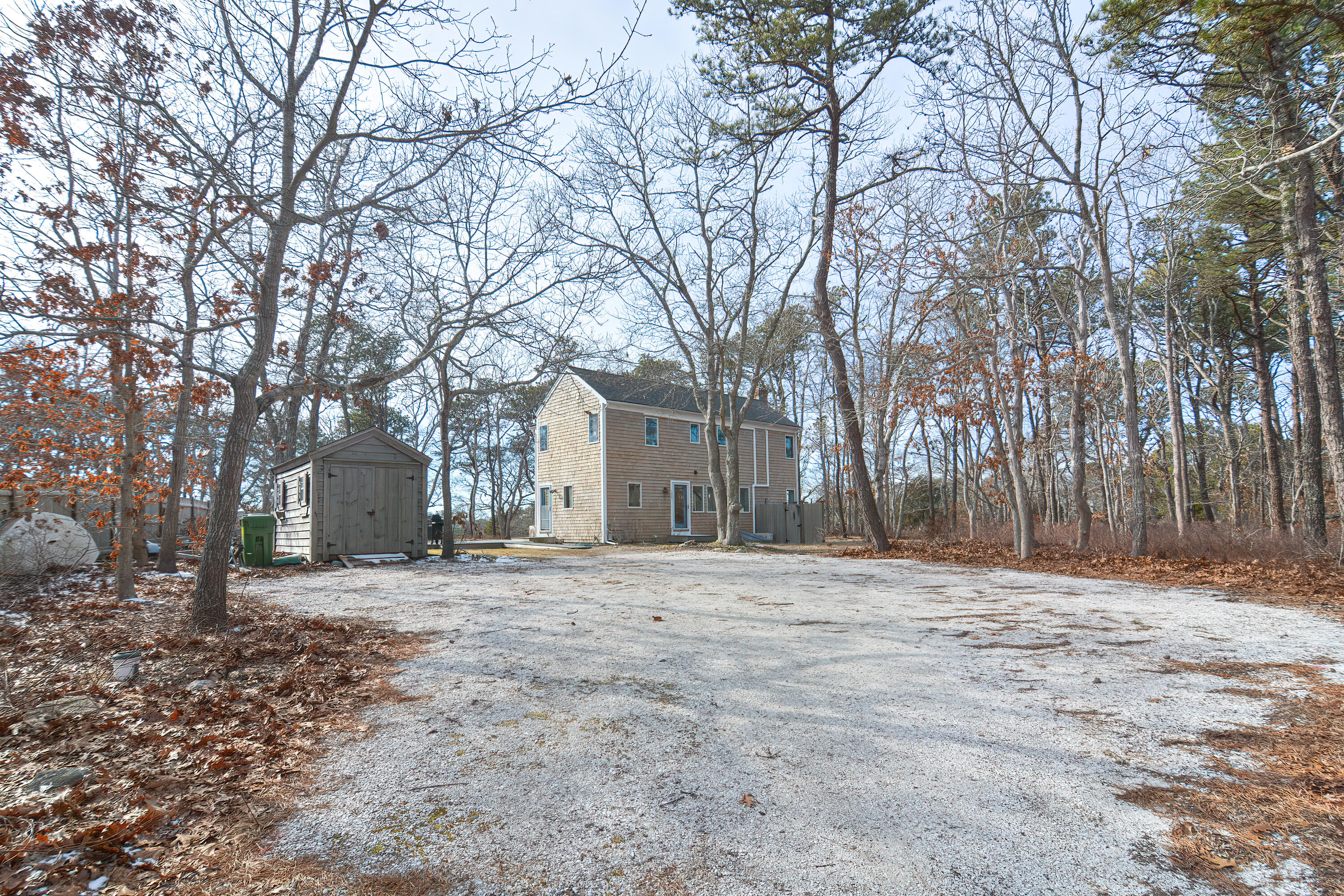 155 Gross Hill Road Wellfleet, MA 02667 - Photo 6 of 52 a tree is standing in a yard