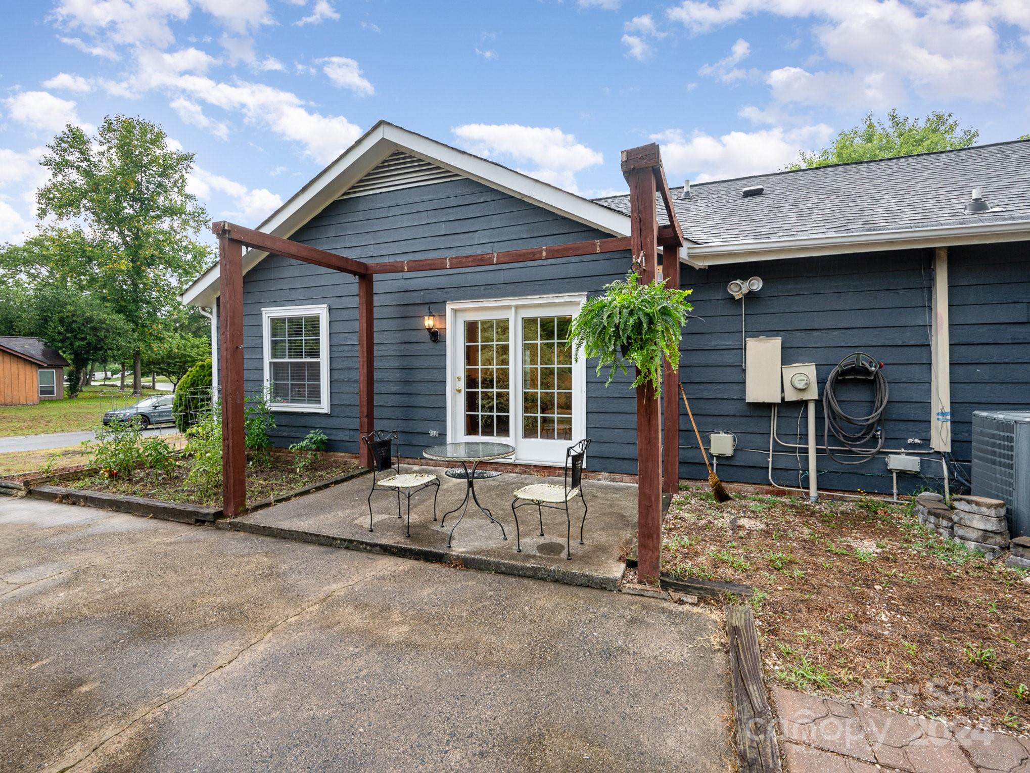 11625 Park Road Charlotte, NC 28226 - Photo 26 of 28 a house view with a outdoor space