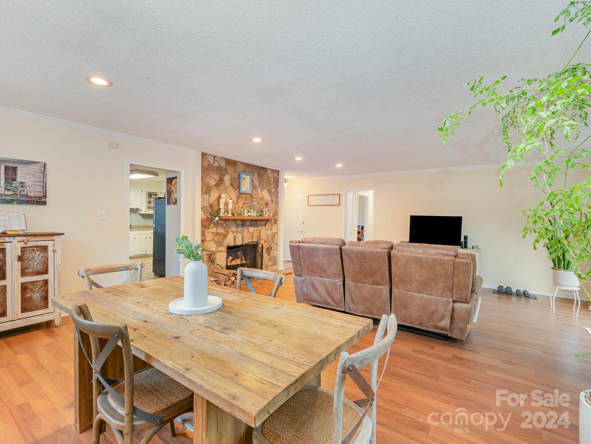 11625 Park Road Charlotte, NC 28226 - Photo 7 of 28 a living room with furniture and a wooden floor
