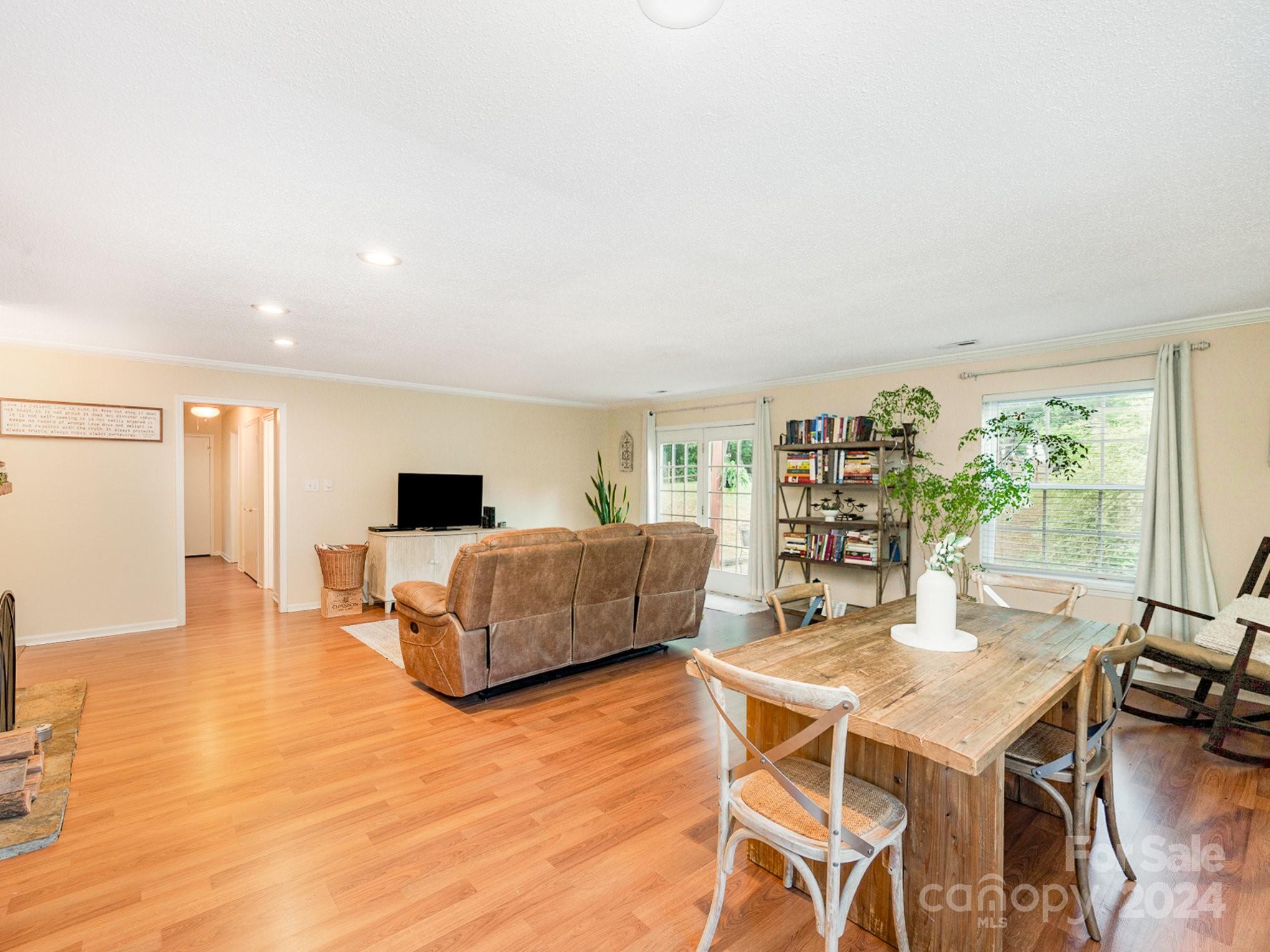 11625 Park Road Charlotte, NC 28226 - Photo 10 of 28 a living room with furniture and a large window