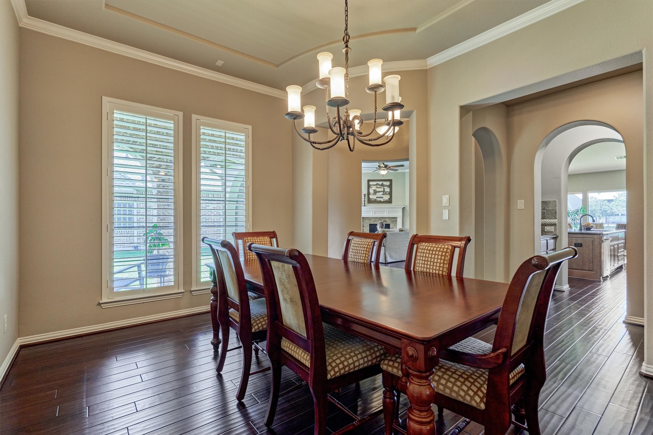 82 East Crystal Canyon Circle The Woodlands, TX 77389 - Photo 17 of 50 Home shows like new with neatly appointed interior paint as seen in this picturesque dining room with crown molding and scalloped ceiling.