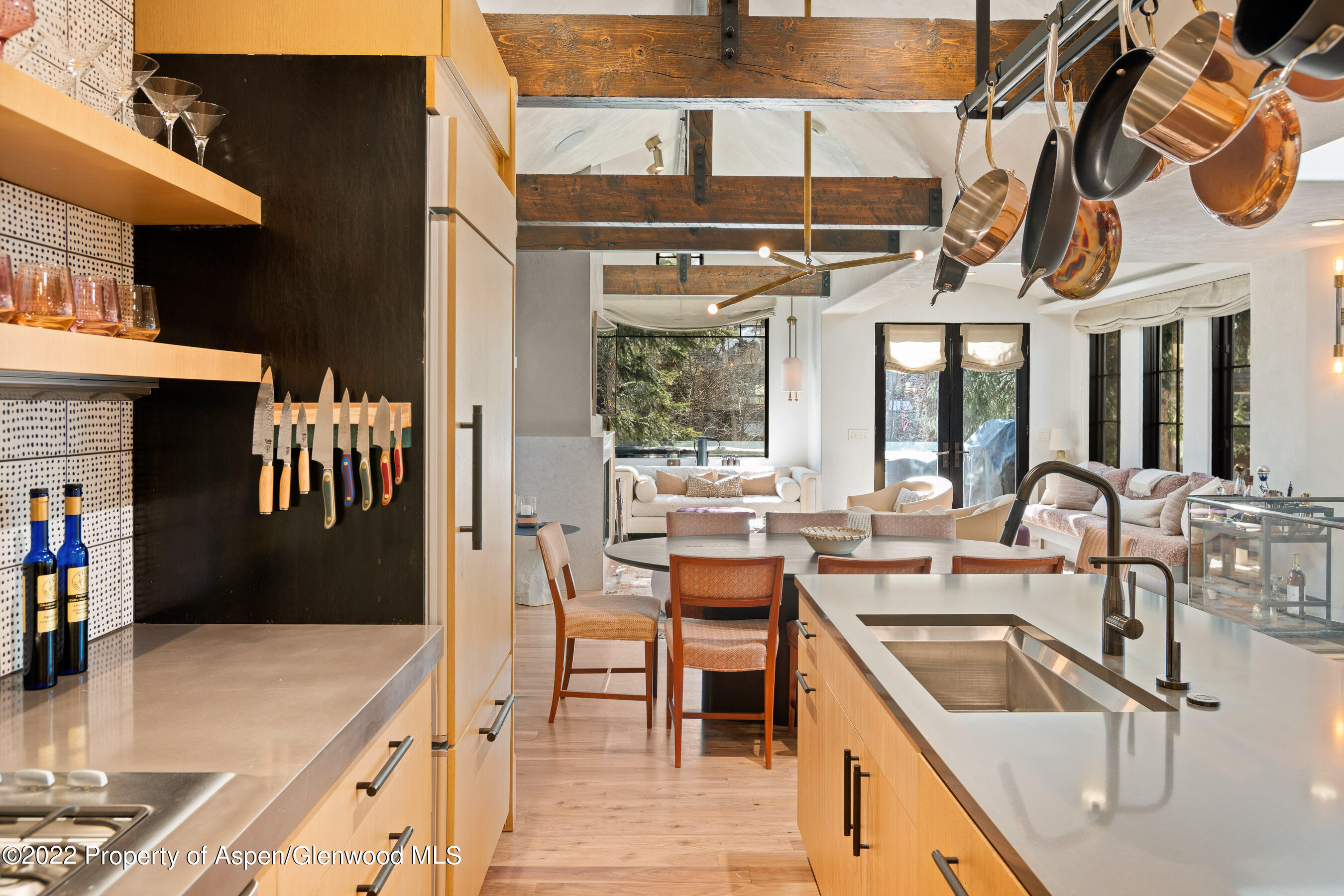 940 East Hyman Avenue Aspen, CO 81611 - Photo 12 of 32 a kitchen with a sink and a stove top oven