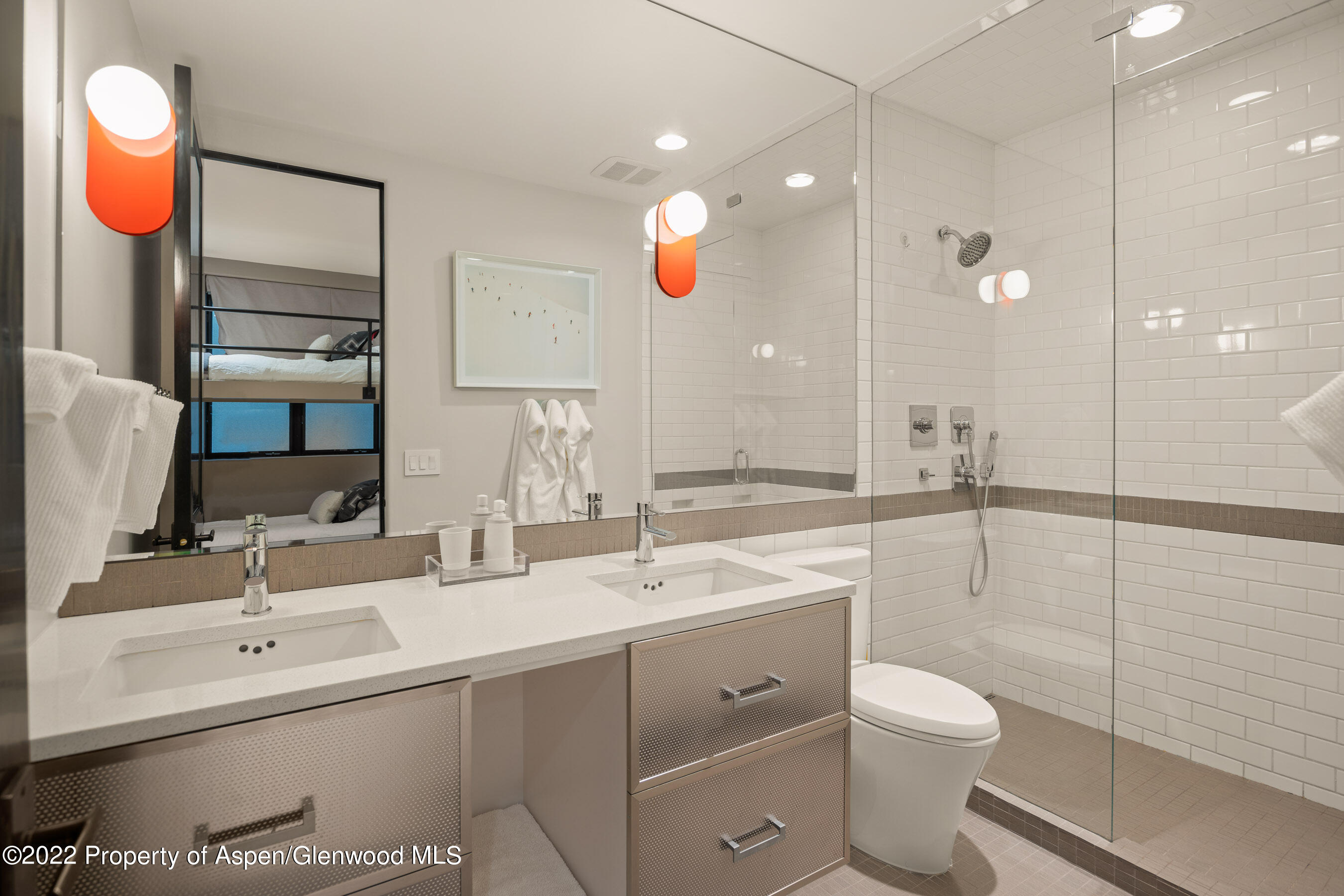 940 East Hyman Avenue Aspen, CO 81611 - Photo 32 of 32 a bathroom with a sink a toilet and a mirror