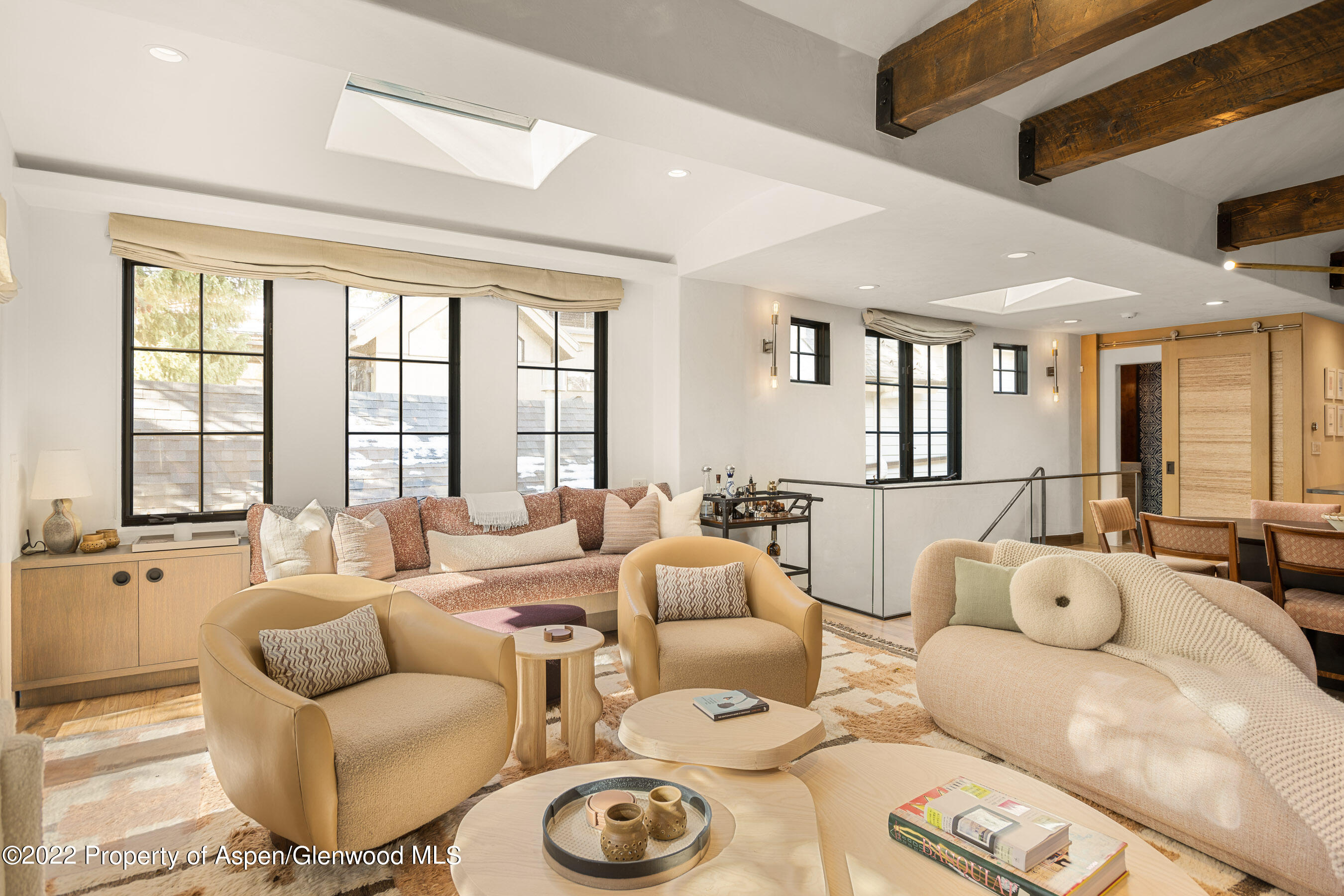 940 East Hyman Avenue Aspen, CO 81611 - Photo 4 of 32 a living room with furniture and a large window