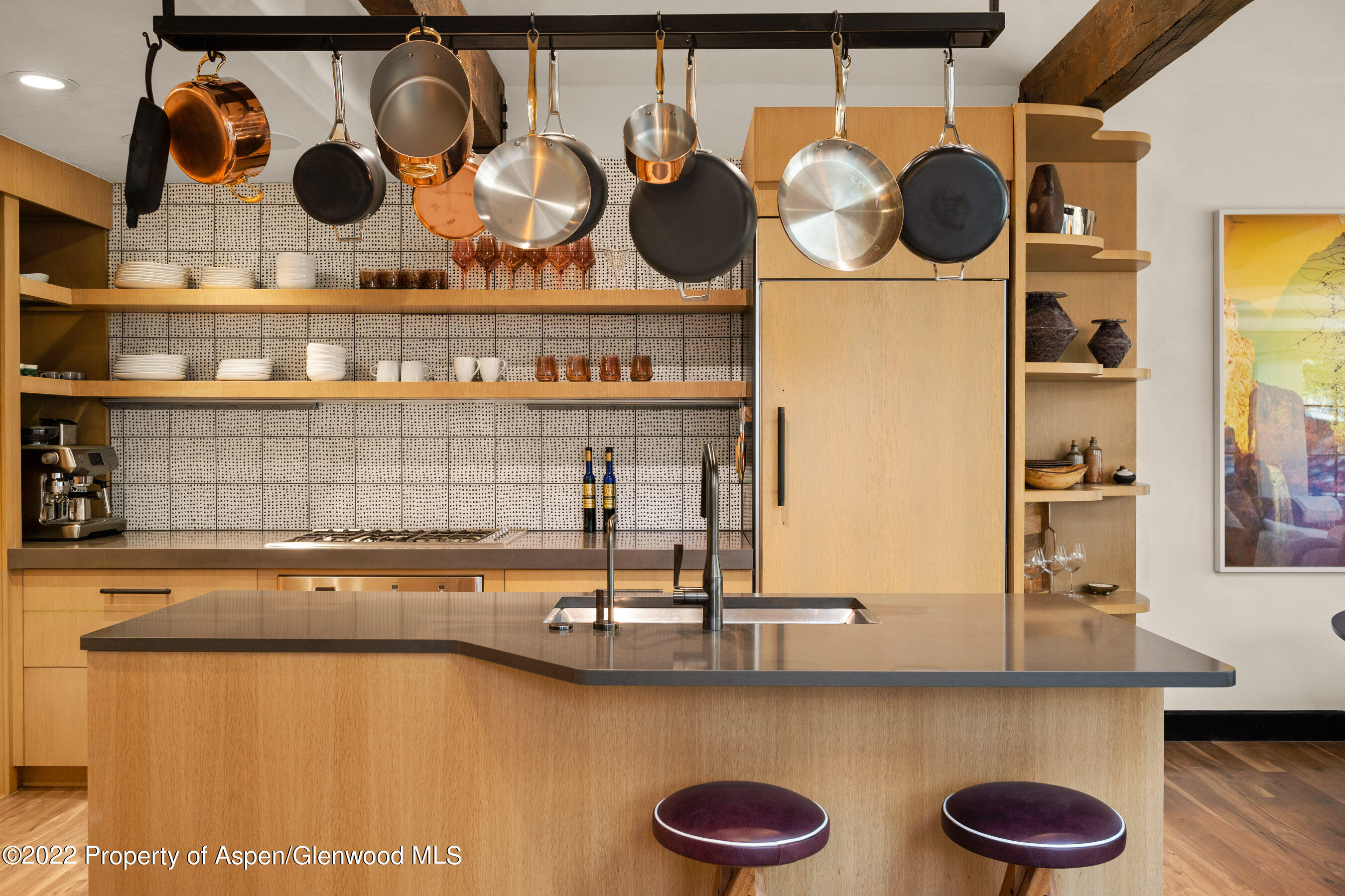 940 East Hyman Avenue Aspen, CO 81611 - Photo 10 of 32 a kitchen with a stove and cabinets