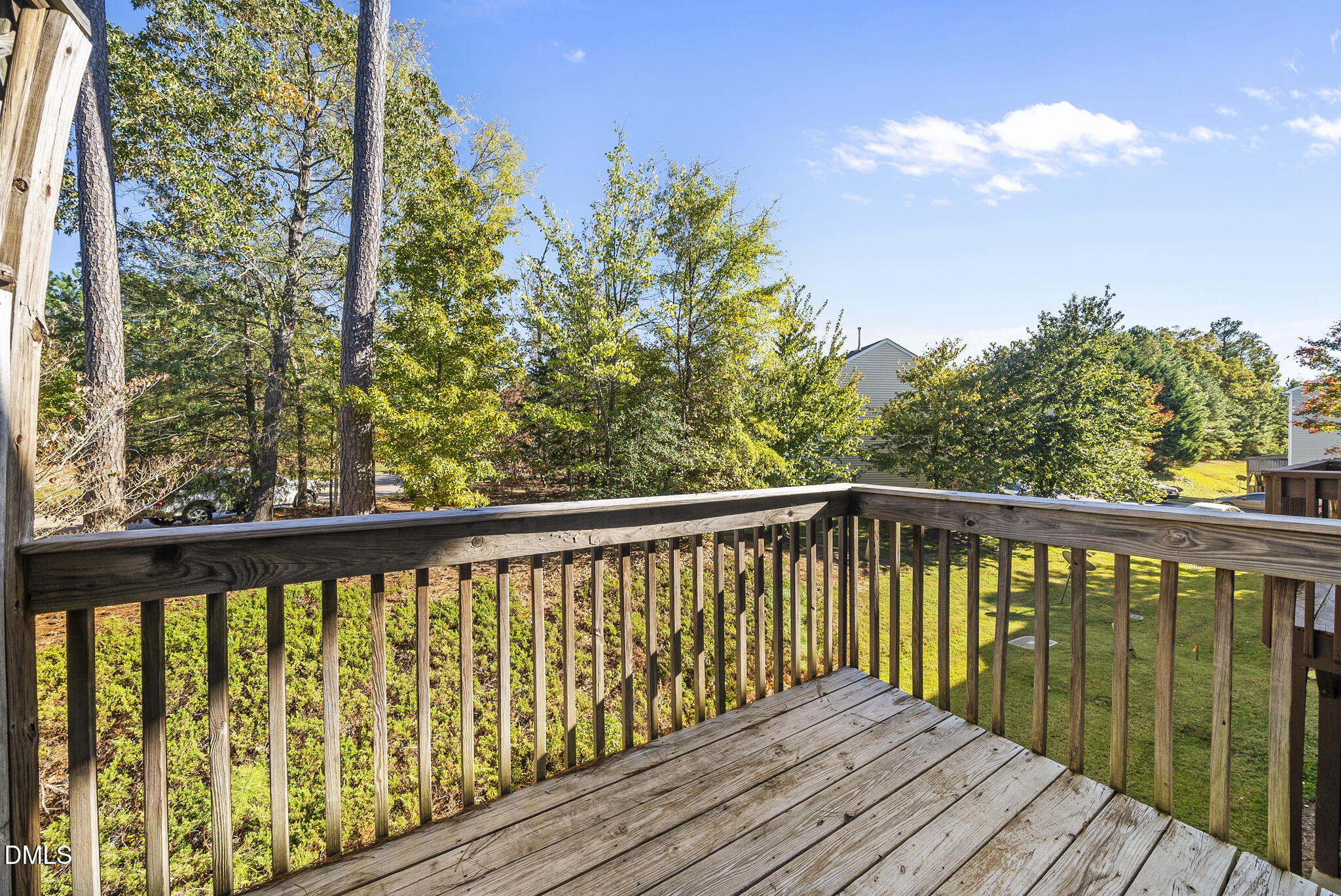 2615 Wyntercrest Lane Durham, NC 27713 - Photo 23 of 34 a balcony with wooden floor and fence