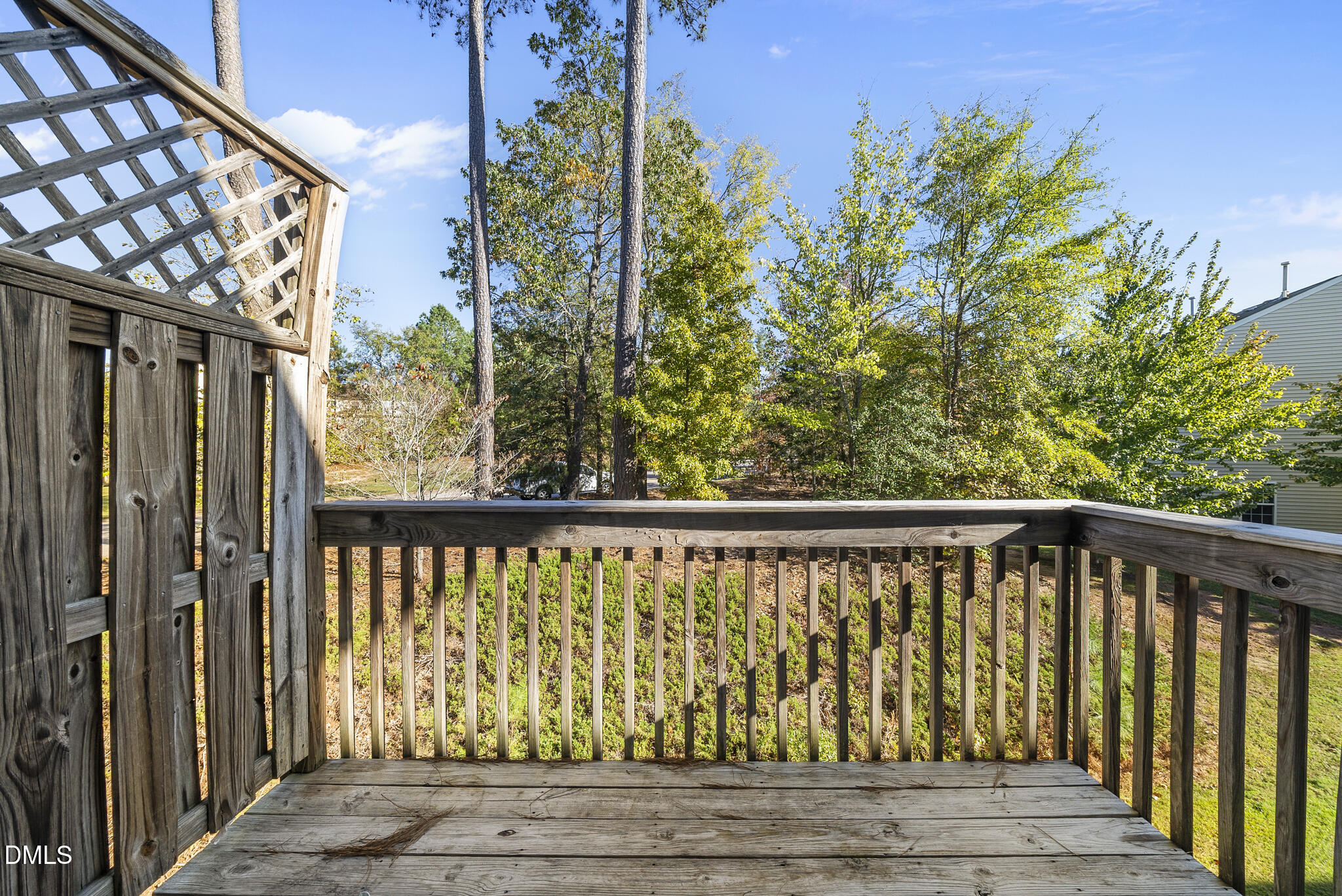 2615 Wyntercrest Lane Durham, NC 27713 - Photo 24 of 34 a view of roof deck with wooden floor and fence
