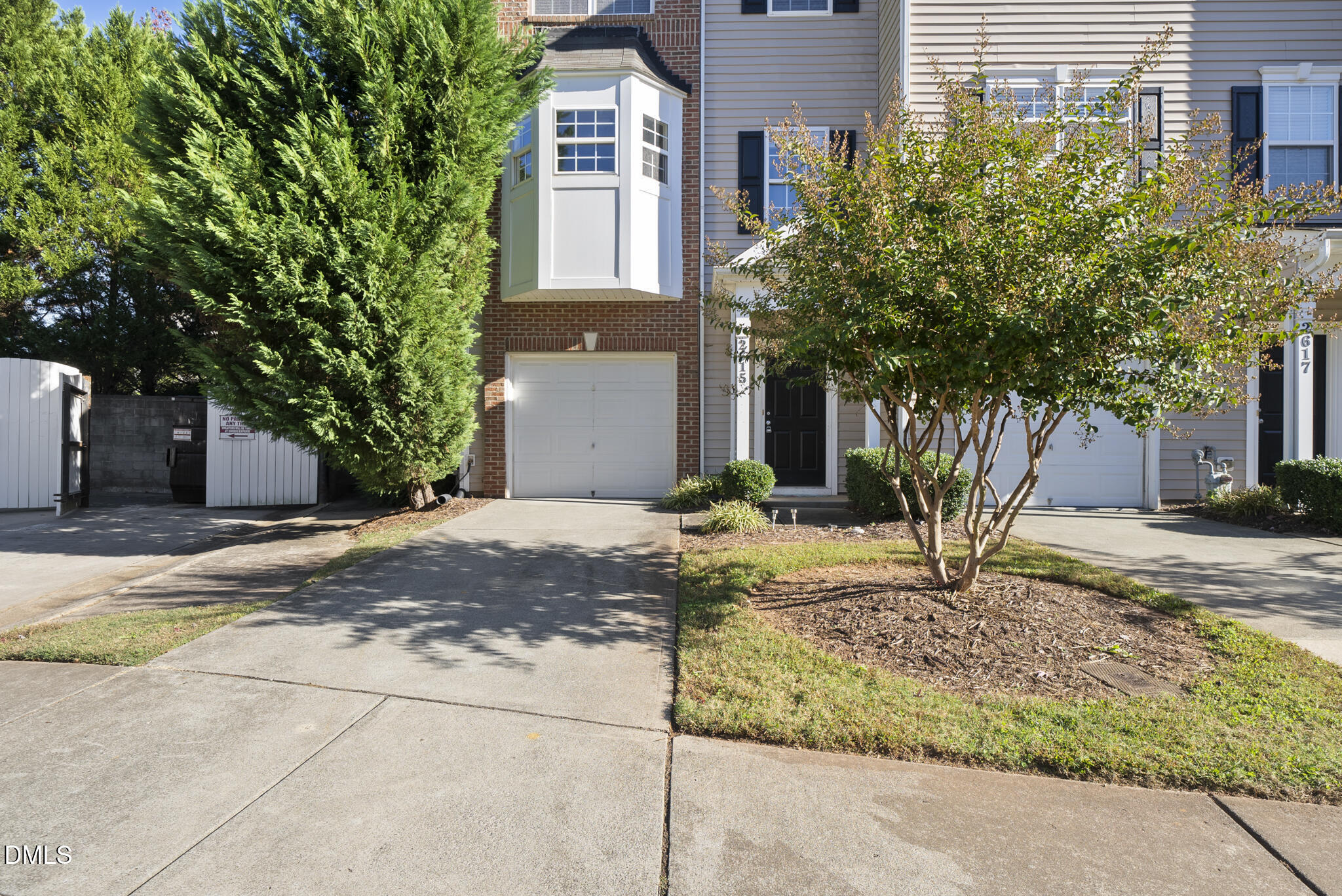 2615 Wyntercrest Lane Durham, NC 27713 - Photo 3 of 34 a house that has a tree in front of it
