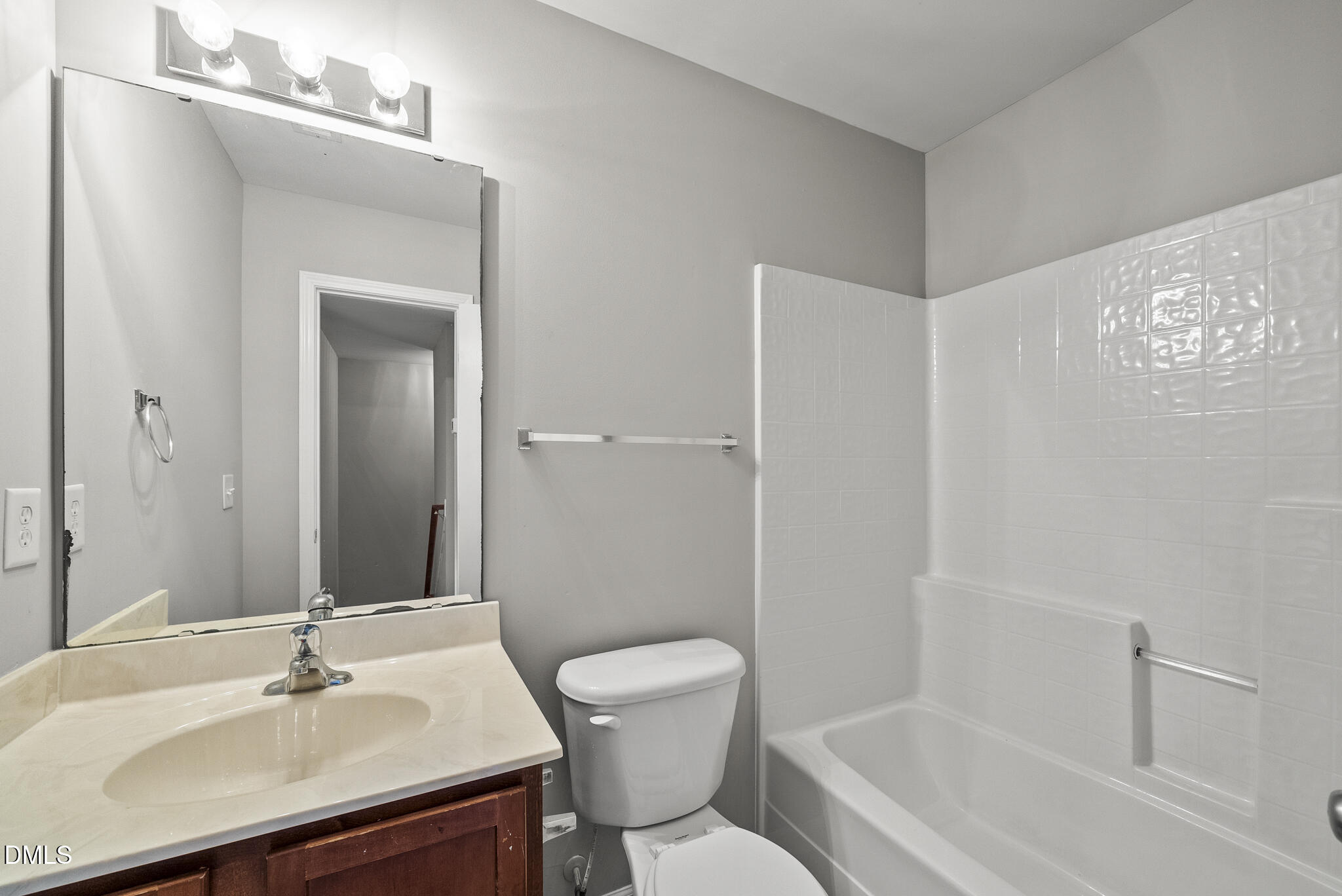 2615 Wyntercrest Lane Durham, NC 27713 - Photo 34 of 34 a bathroom with a sink toilet and shower