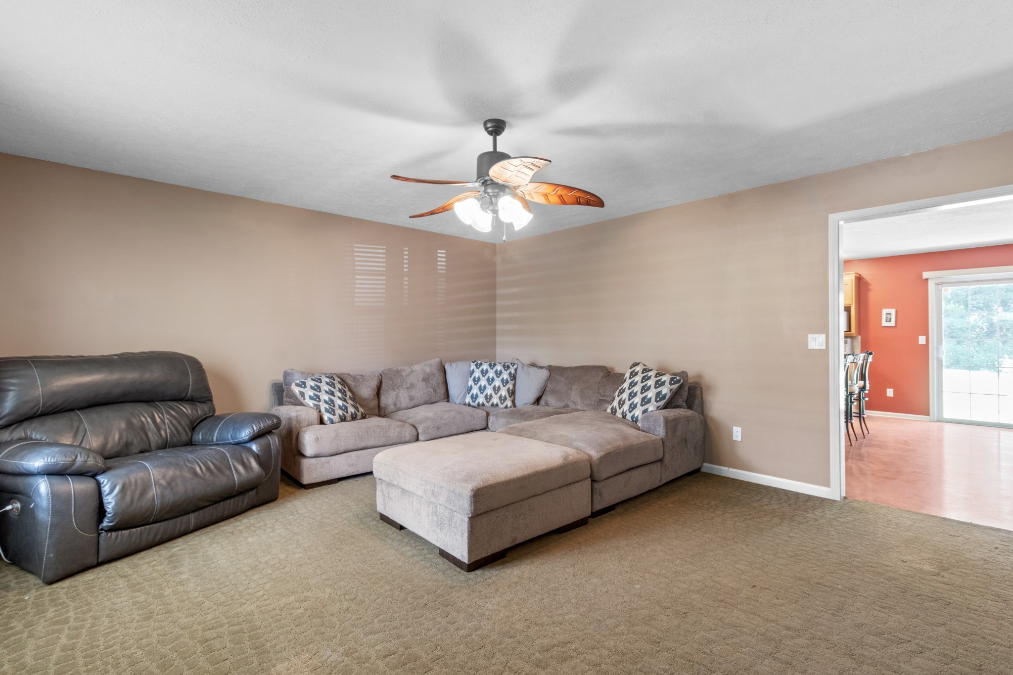 1033 Sivley Road Hopkinsville, KY 42240 - Photo 8 of 23 a living room with furniture and a chandelier