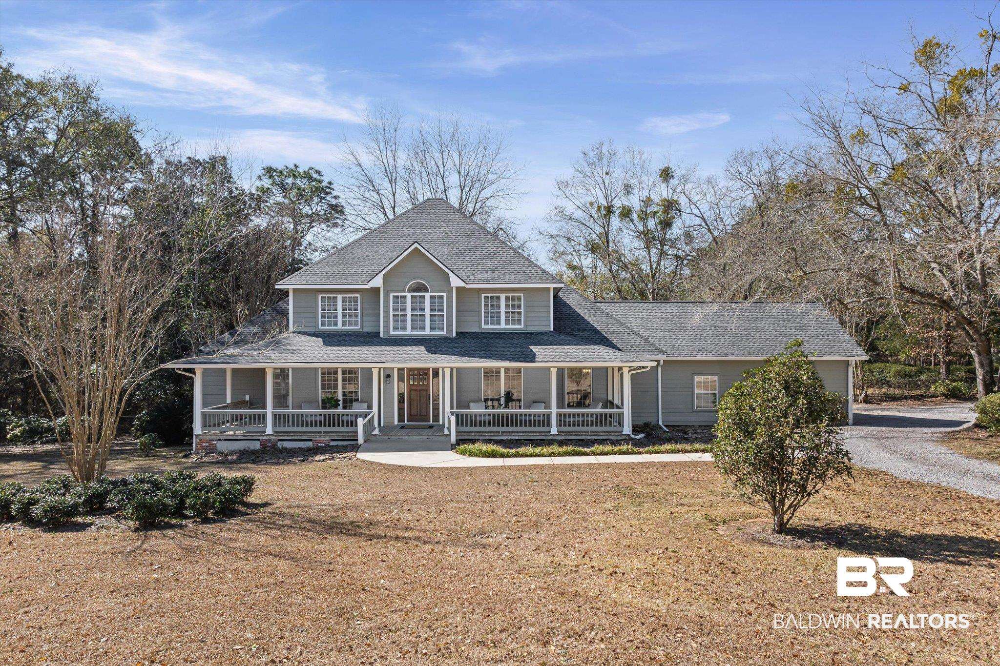 31369 Blakeley Way Daphne, AL 36527 - Photo 32 of 38 View of front of property with covered porch, a shingled roof, driveway, and a front lawn