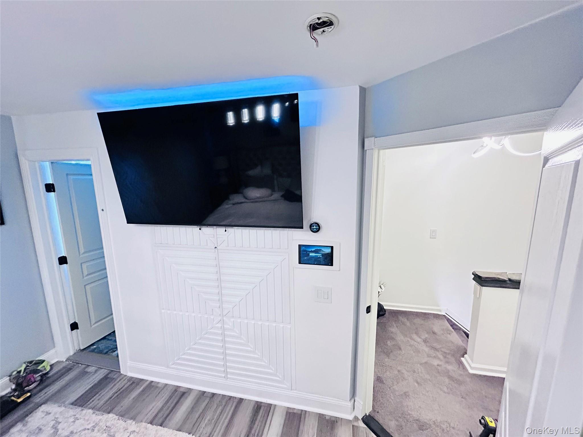 58 Rialto Way Patchogue, NY 11772 - Photo 23 of 40 a view of entryway with wooden floor