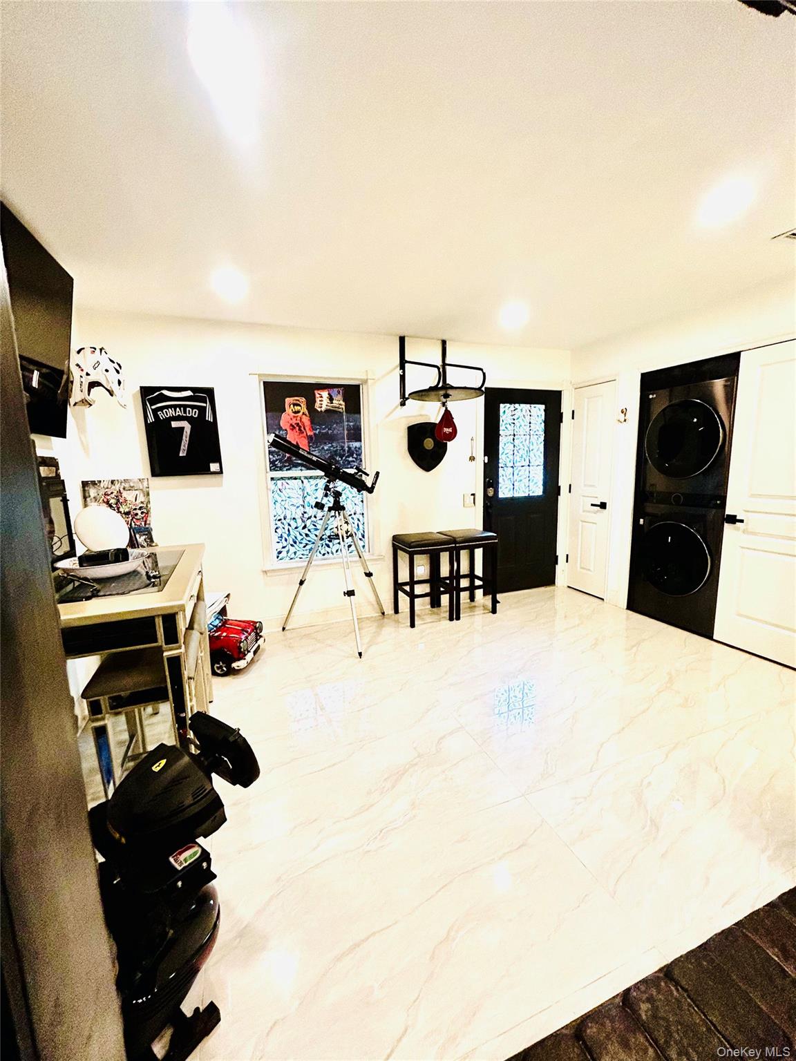 58 Rialto Way Patchogue, NY 11772 - Photo 31 of 40 Game room with stacked washing machine and dryer and recessed lighting