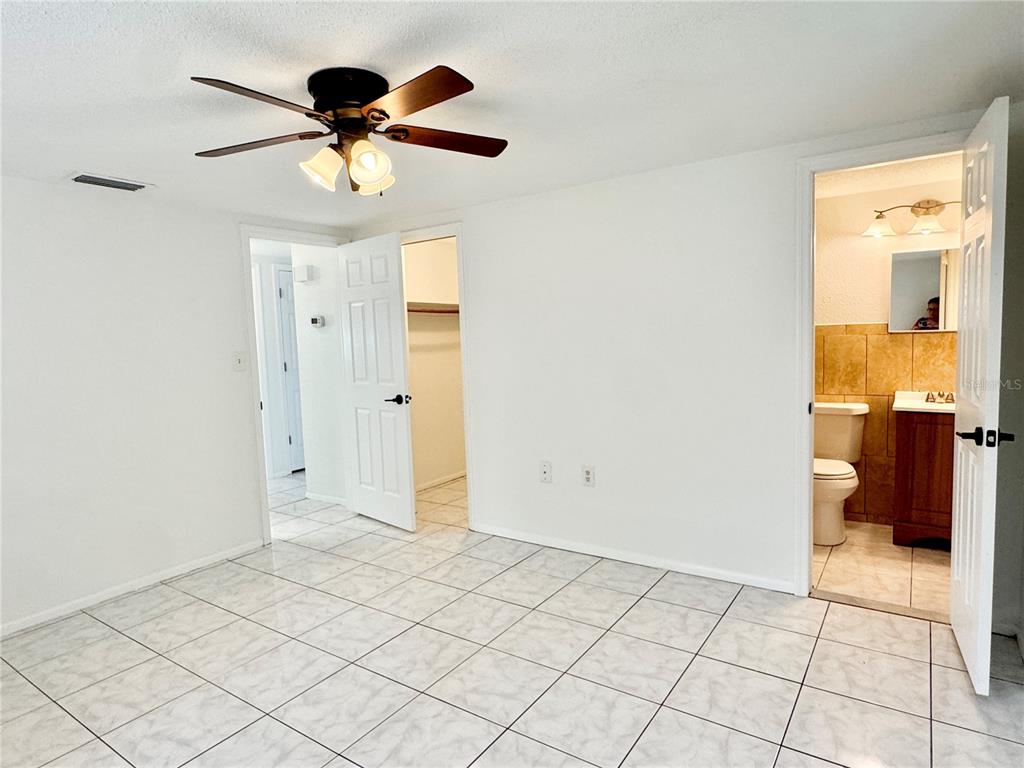 7235 Potomac Drive Port Richey, FL 34668 - Photo 14 of 23 a view of an empty room and a bathroom