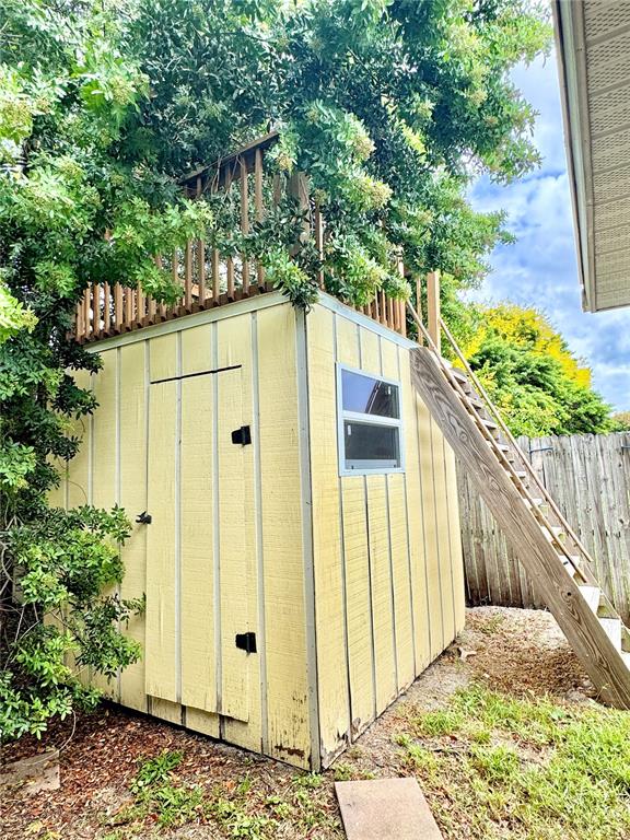 7235 Potomac Drive Port Richey, FL 34668 - Photo 23 of 23 a side view of a house with a small yard