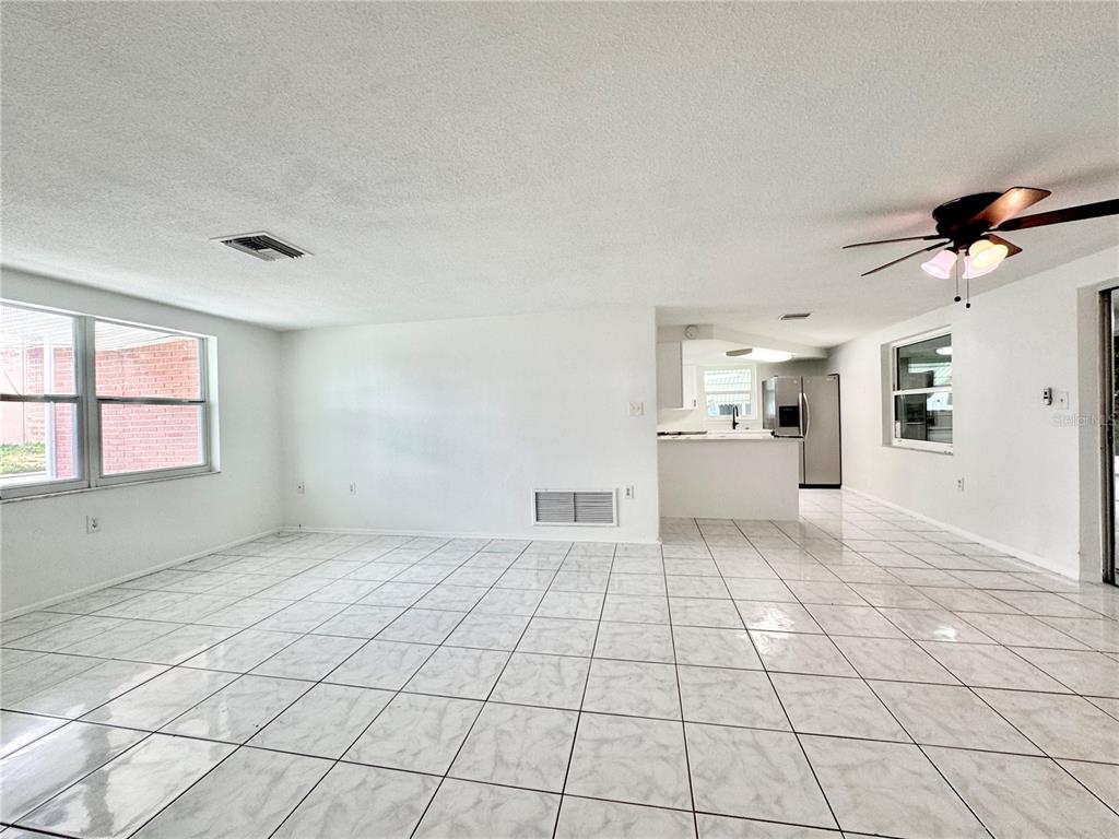 7235 Potomac Drive Port Richey, FL 34668 - Photo 6 of 23 a view of an empty room with a window