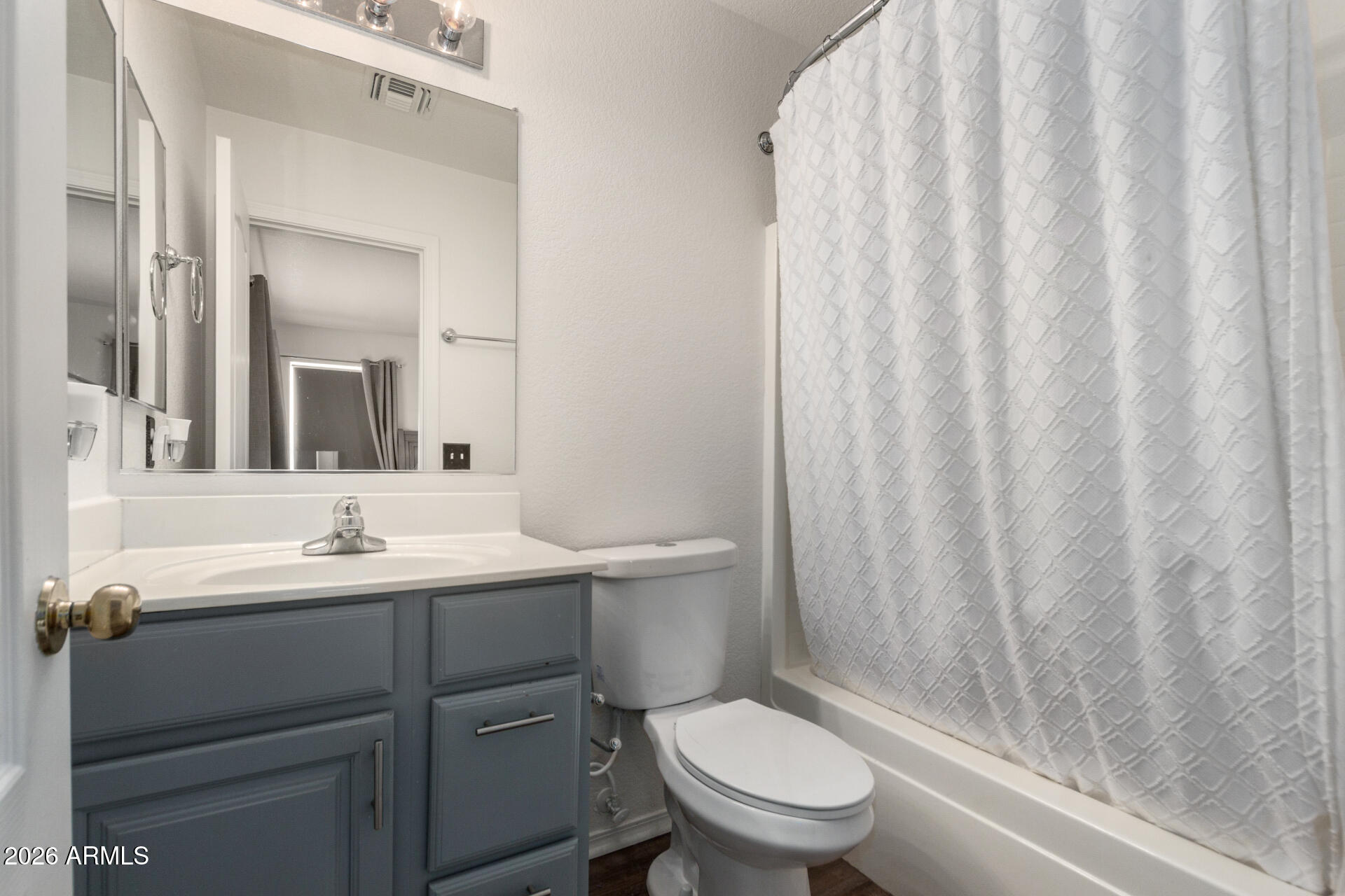 8806 South 9th Street Phoenix, AZ 85042 - Photo 16 of 31 a bathroom with a sink a toilet and shower