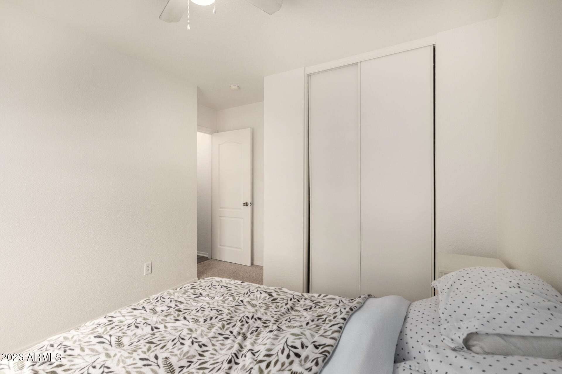 8806 South 9th Street Phoenix, AZ 85042 - Photo 23 of 31 a bedroom with a bed and a window