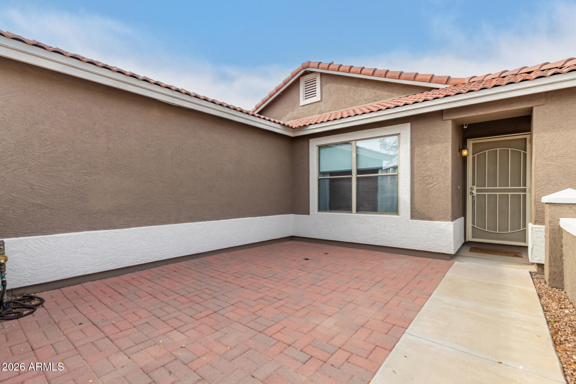 8806 South 9th Street Phoenix, AZ 85042 - Photo 4 of 31 a view of a living room with a large window