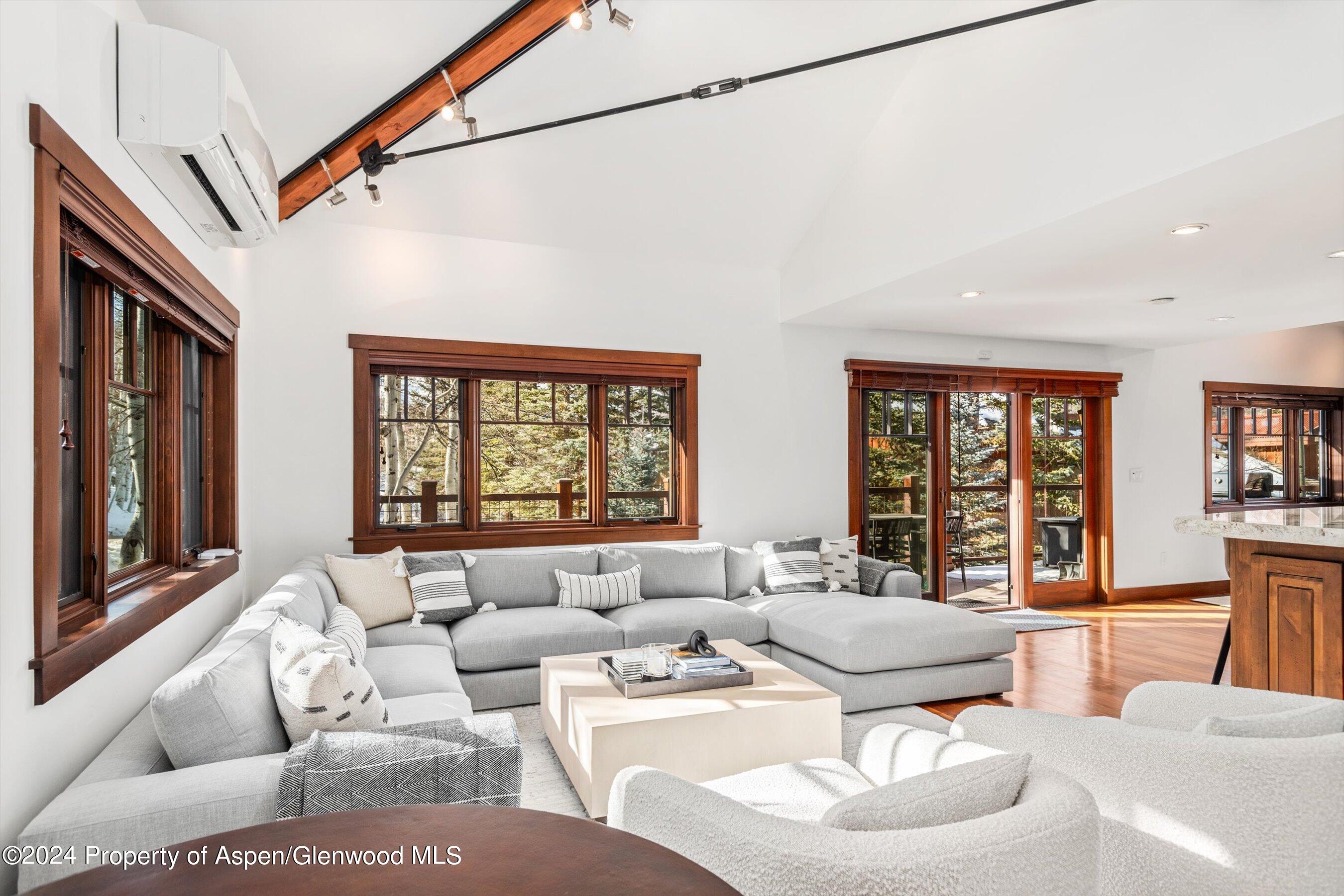 227 Faraway Road, Unit 38 Snowmass Village, CO 81615 - Photo 5 of 71 a living room with furniture and a large window