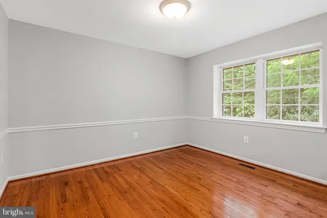 a kitchen with stainless steel appliances granite countertop a refrigerator sink and cabinets