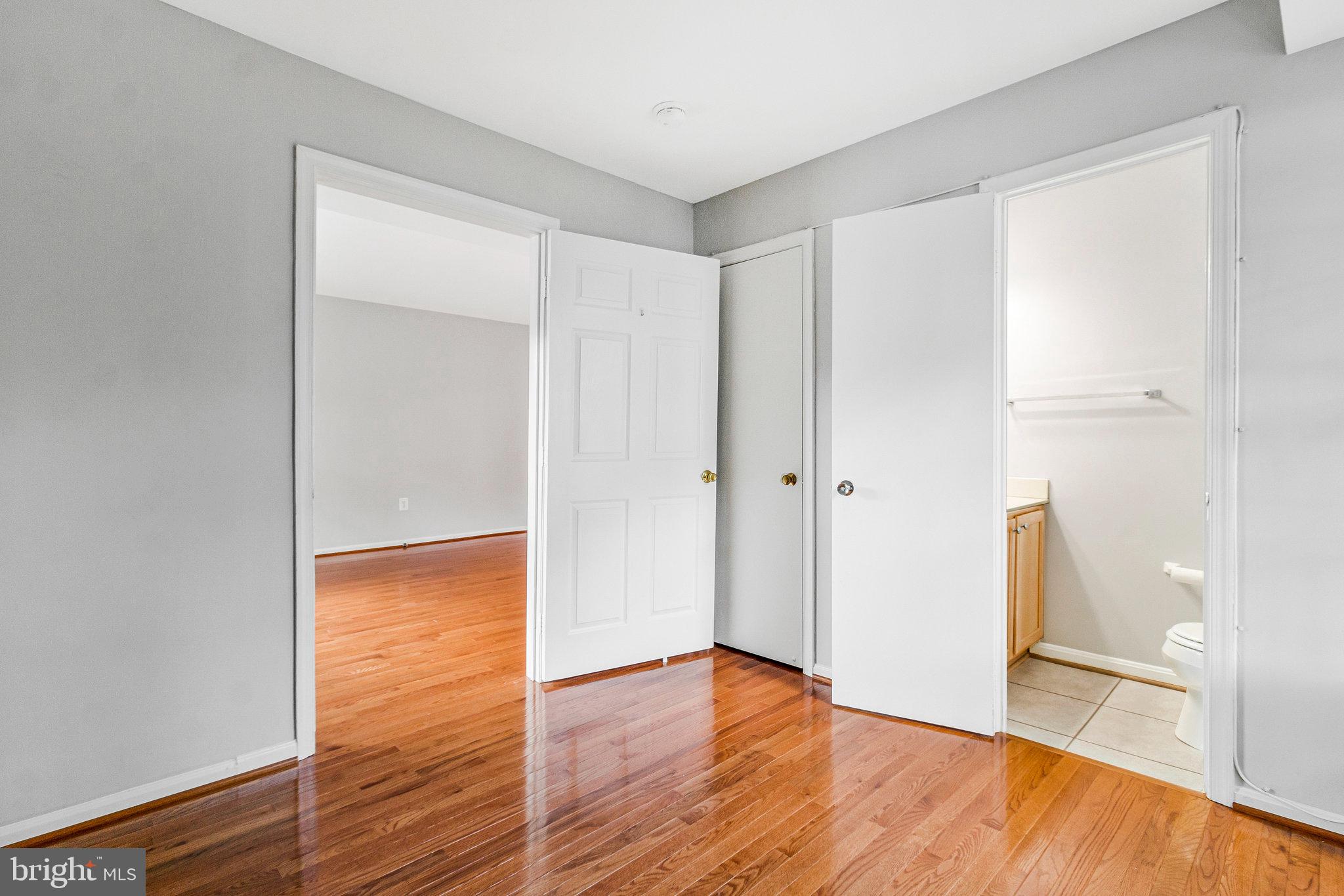 8020 Sleepy View Lane Springfield, VA 22153 - Photo 17 of 53 a view of an empty room with wooden floor
