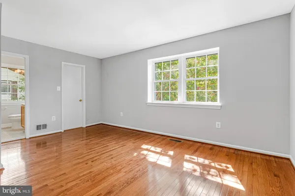 a view of small space with wooden floor