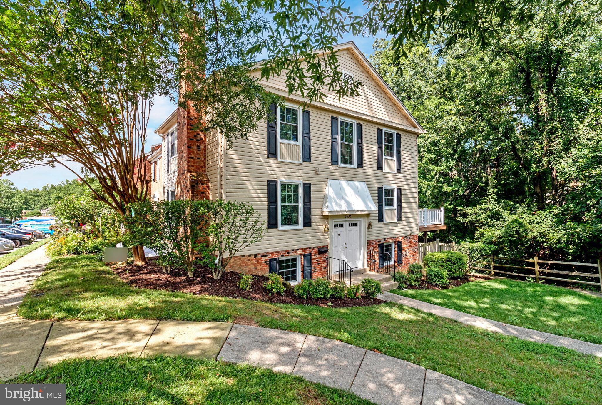 8020 Sleepy View Lane Springfield, VA 22153 - Photo 3 of 53 a view of a house with a yard and plants