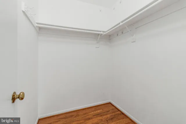 a bathroom with a sink toilet and mirror