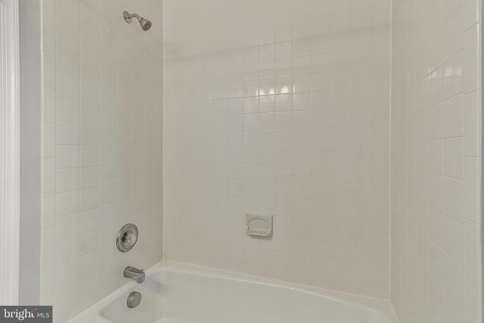 8020 Sleepy View Lane Springfield, VA 22153 - Photo 35 of 53 a bathroom with a bathtub