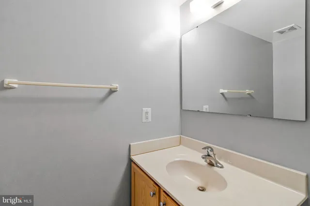 a view of a big room with windows and mountain view