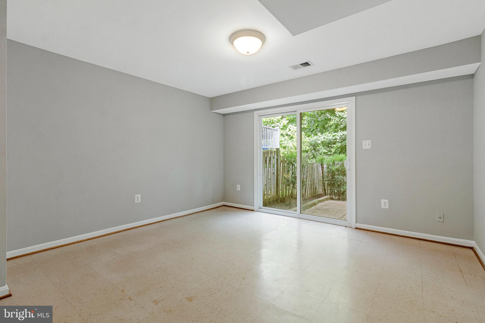 8020 Sleepy View Lane Springfield, VA 22153 - Photo 42 of 53 a view of a big room with windows and mountain view