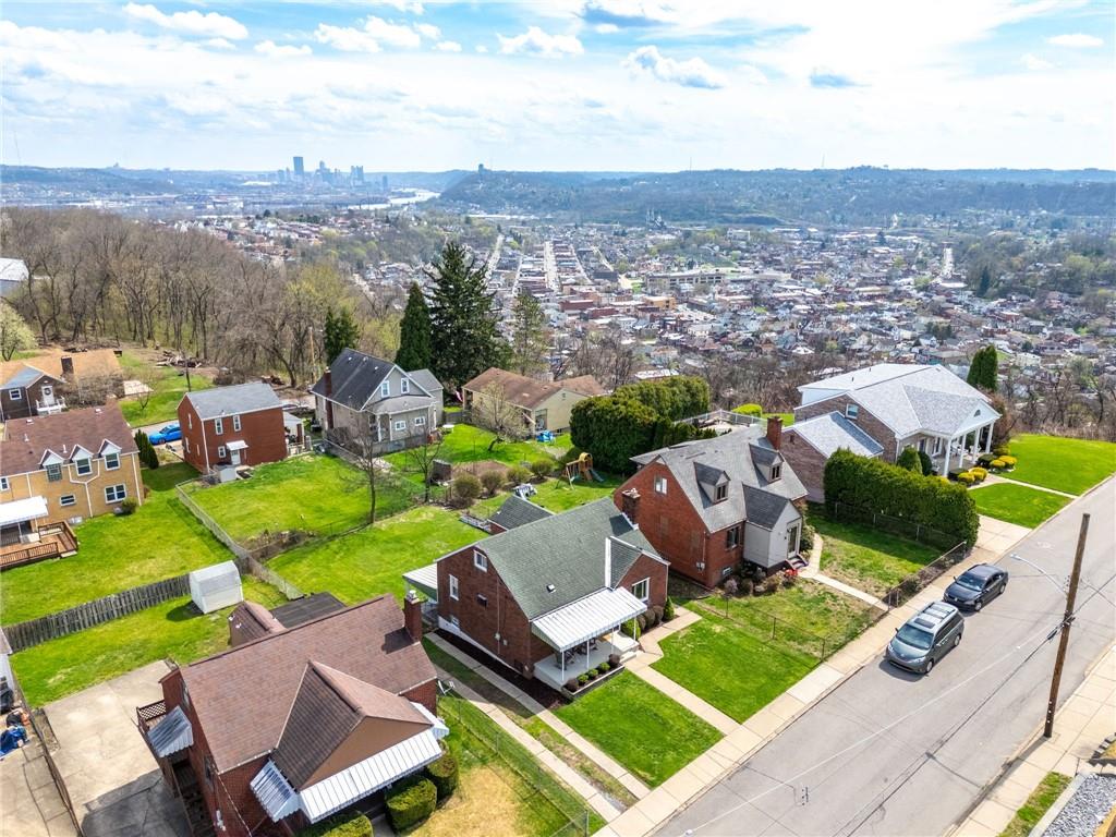 416 Phillips Avenue McKees Rocks, PA 15136 - Photo 42 of 46 a view of a city with lawn chairs