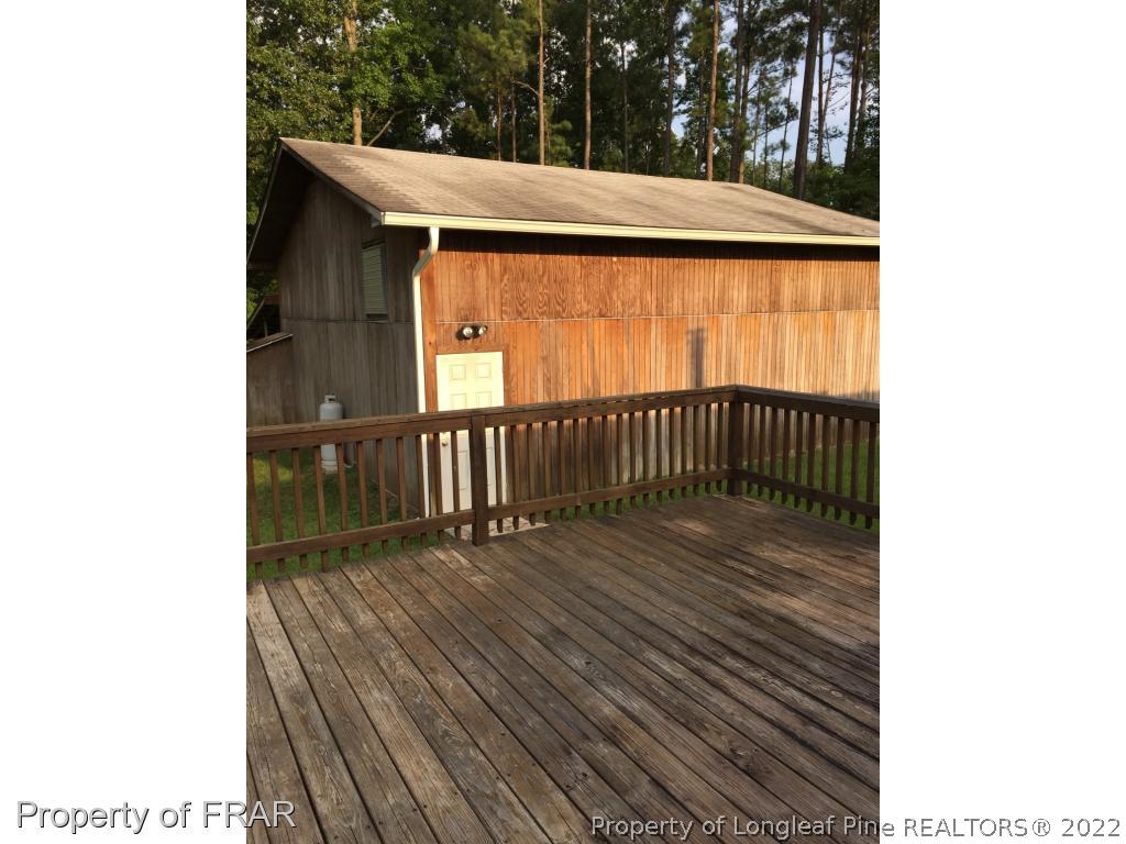 275 Deaton Road Raeford, NC 28376 - Photo 14 of 20 a view of outdoor space and deck