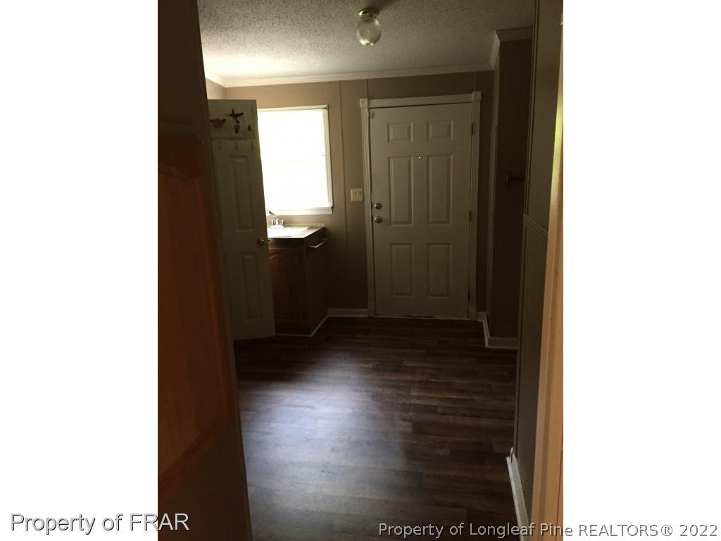 275 Deaton Road Raeford, NC 28376 - Photo 7 of 20 a view of a hallway