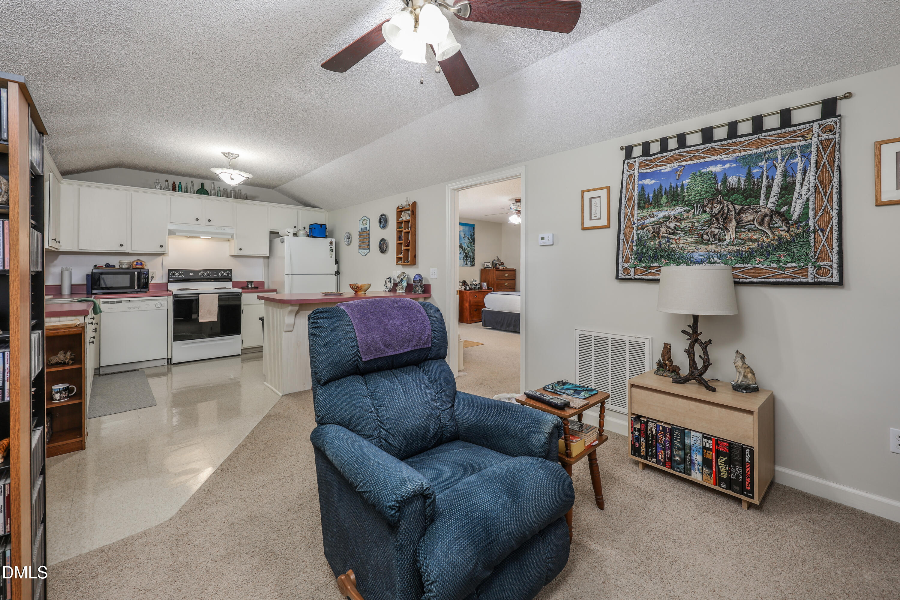 3623-3621 Carl Allred Road Franklinville, NC 27248 - Photo 60 of 76 a living room with furniture and a chandelier