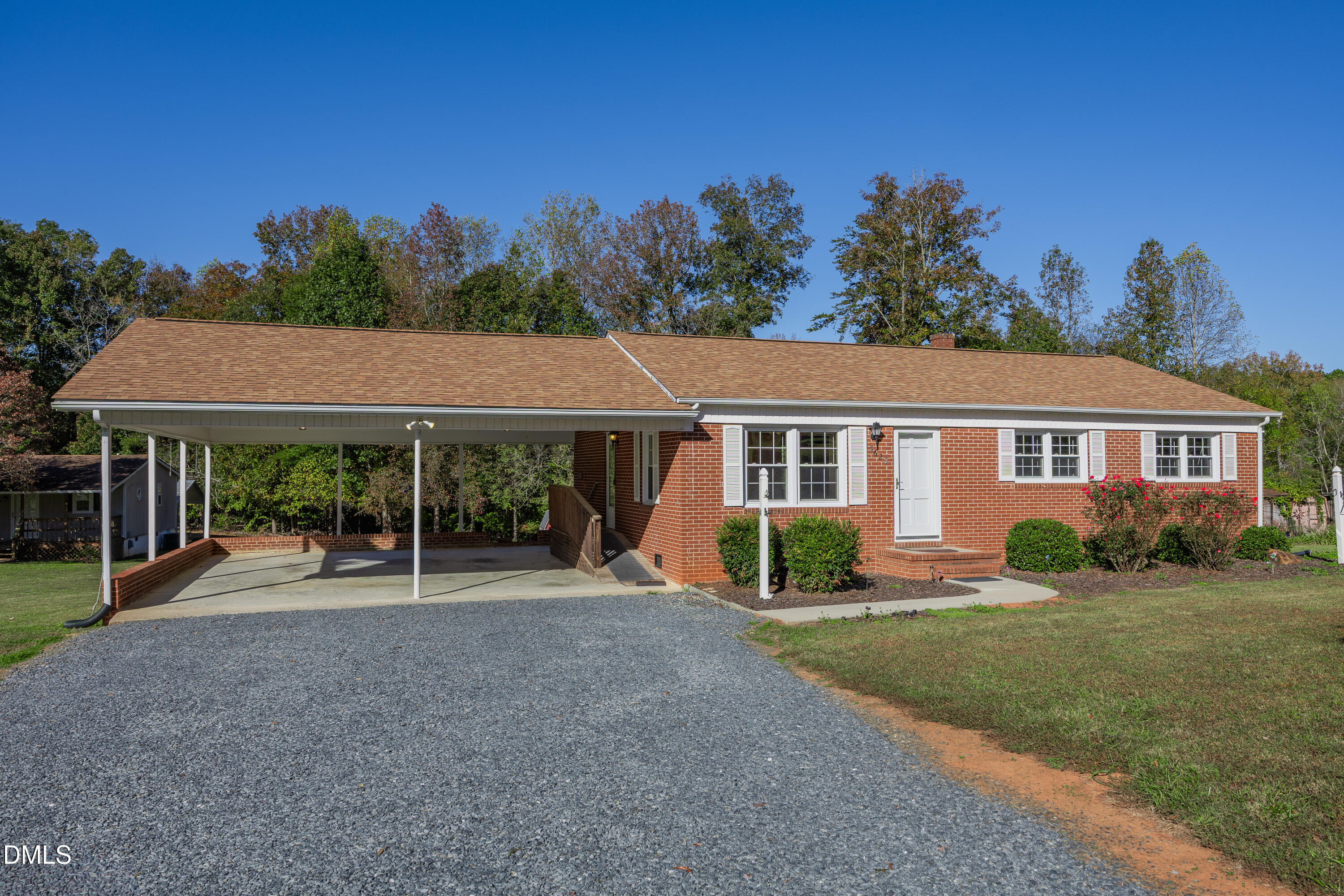 3623-3621 Carl Allred Road Franklinville, NC 27248 - Photo 7 of 76 a front view of a house with a yard and trees