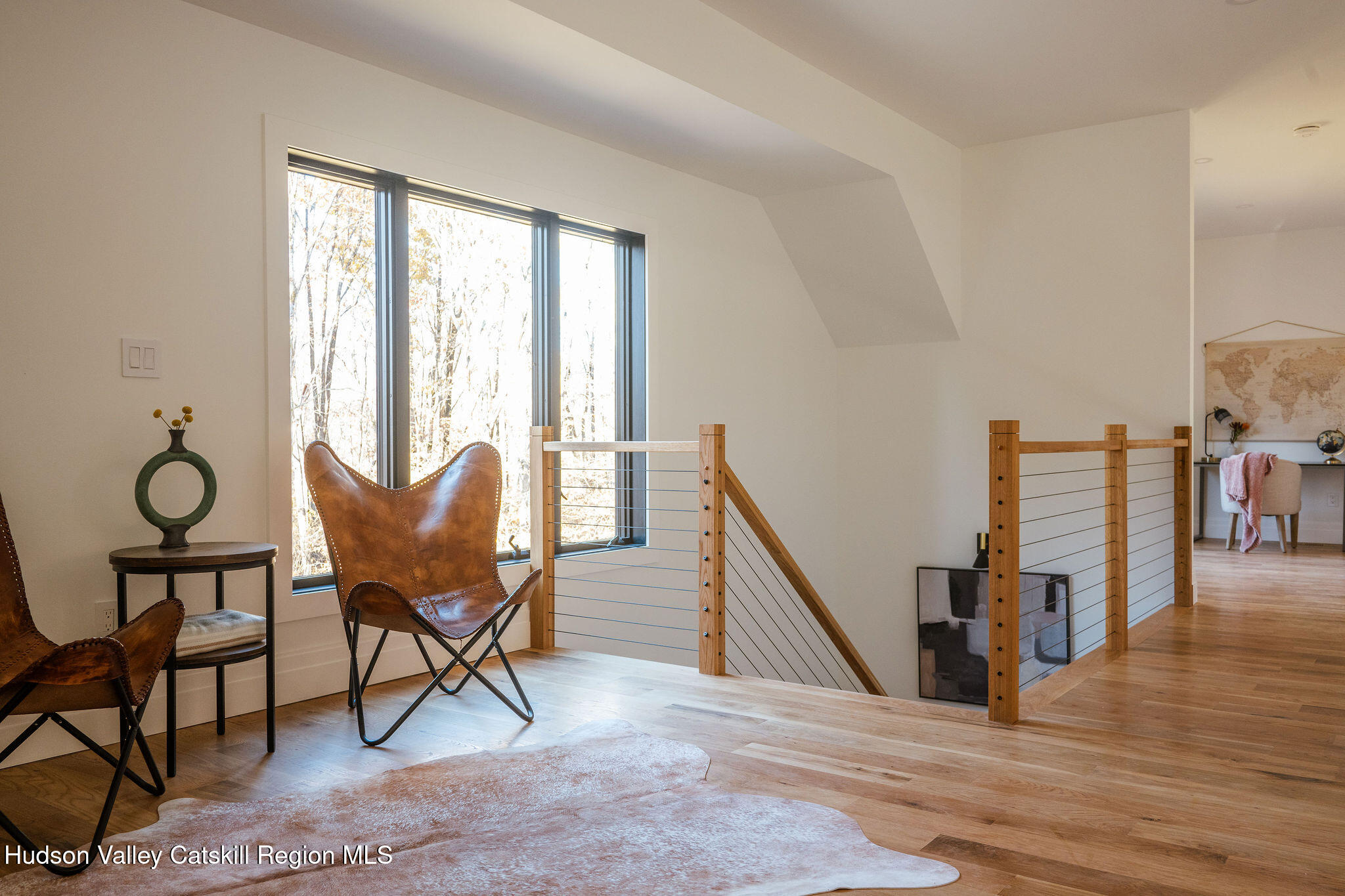 617 Harrington Drive Austerlitz, NY 12017 - Photo 22 of 32 a living room with furniture and a wooden floor