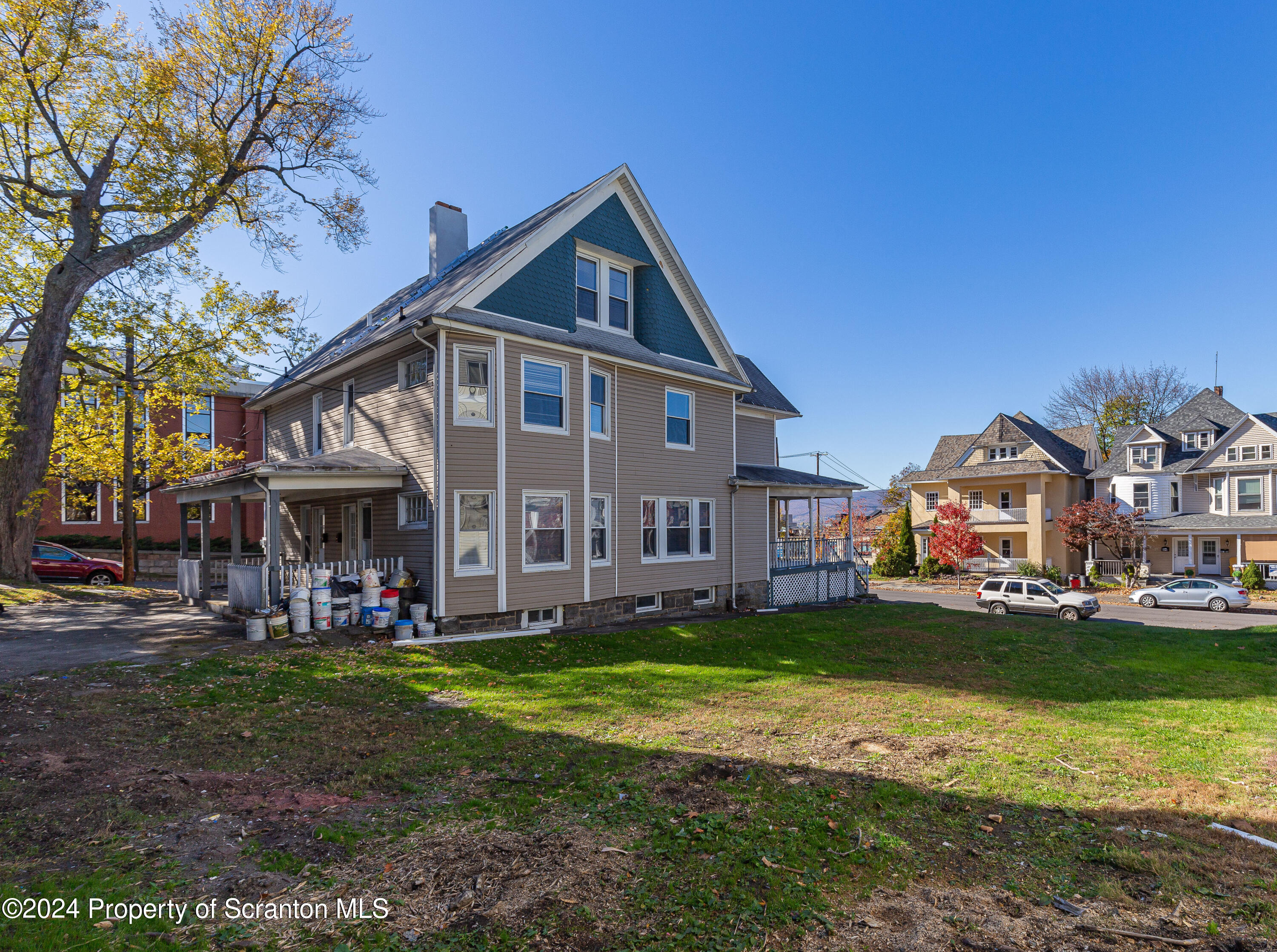 800 Quincy Avenue Scranton, PA 18510 - Photo 13 of 23 a front view of a house with garden